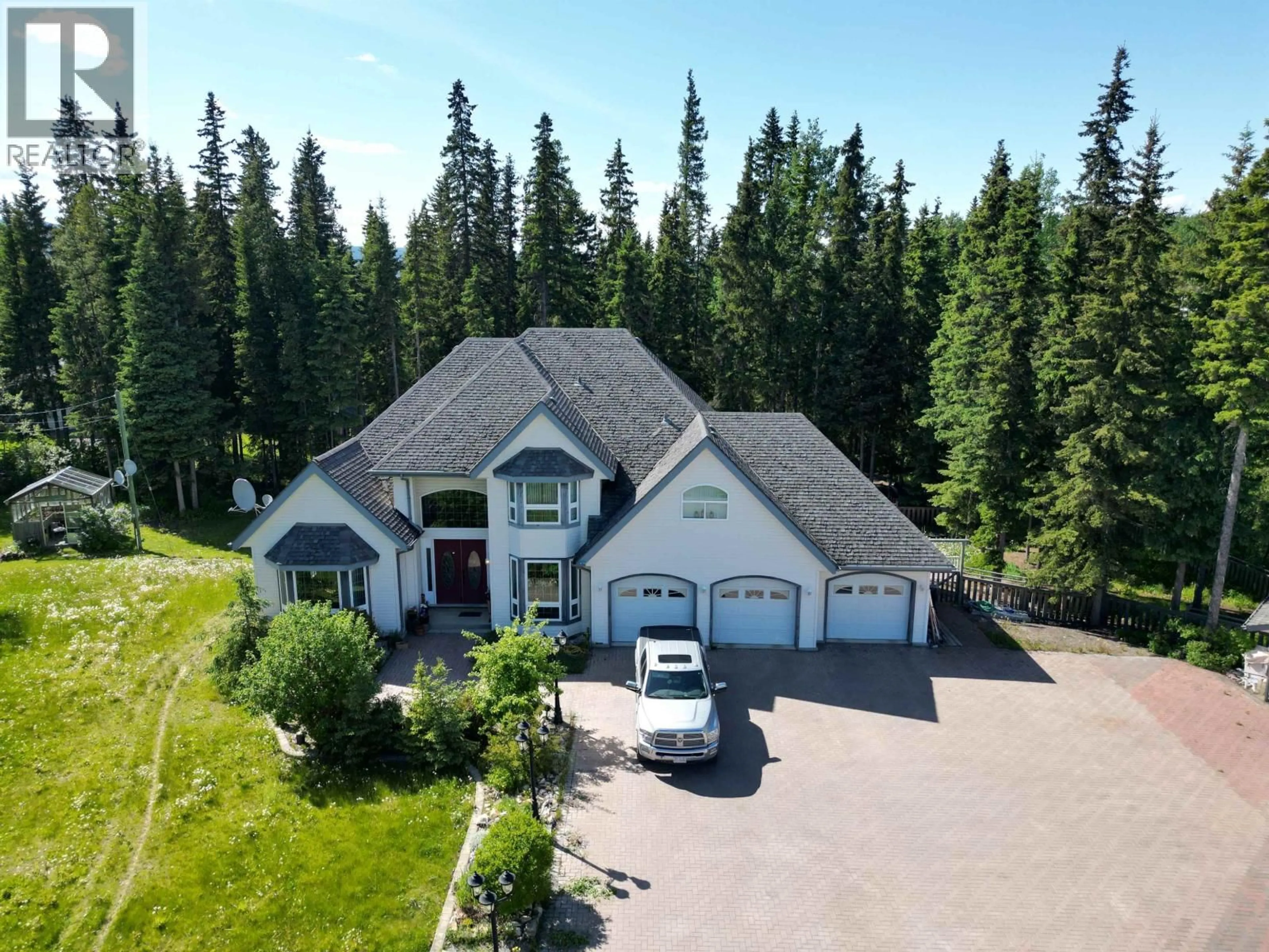 A pic from outside/outdoor area/front of a property/back of a property/a pic from drone, mountain view for 585 5TH AVENUE, Burns Lake British Columbia V0J1E0