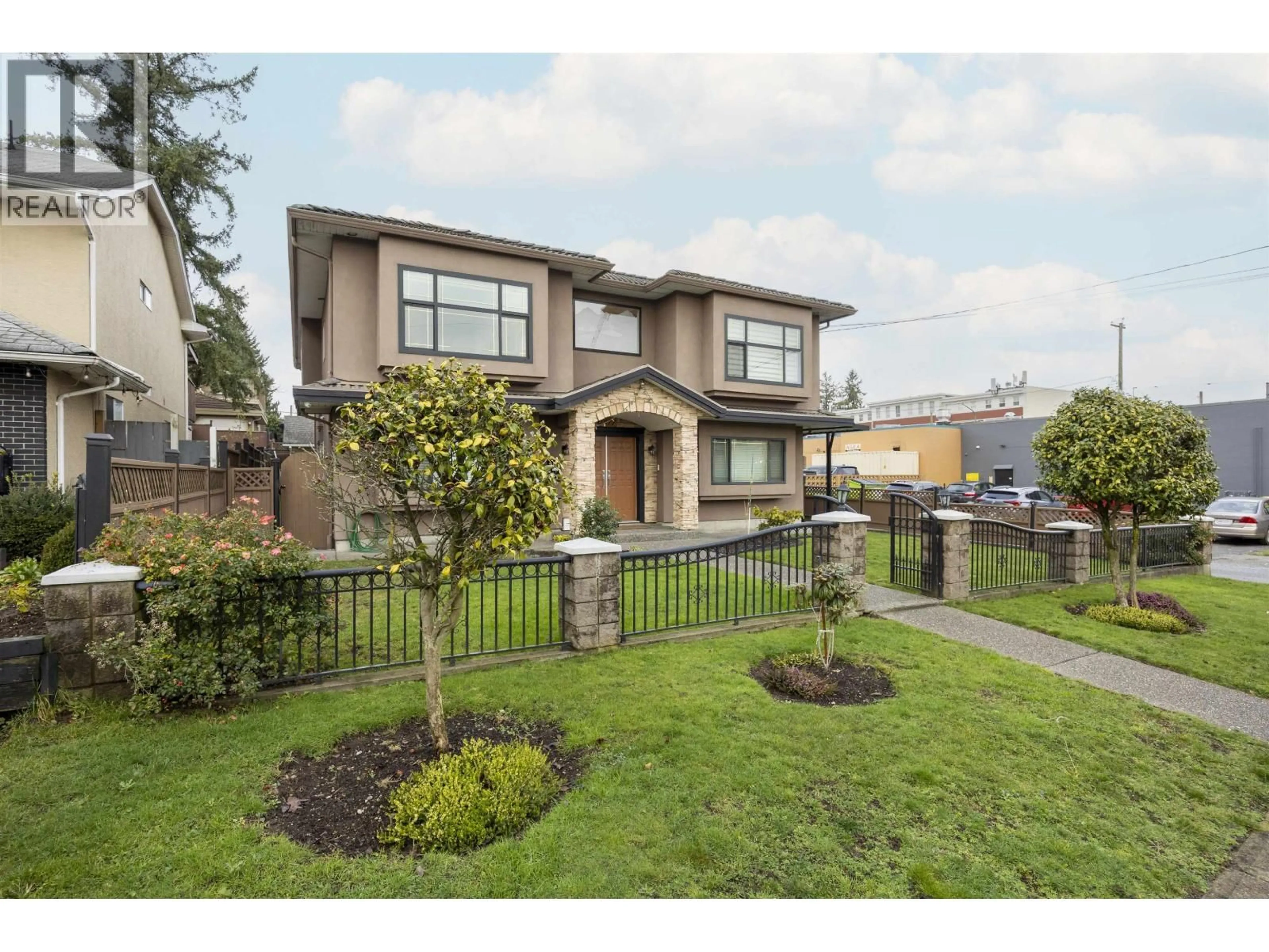 Home with brick exterior material, street for 7877 15TH AVENUE, Burnaby British Columbia V3N1W7
