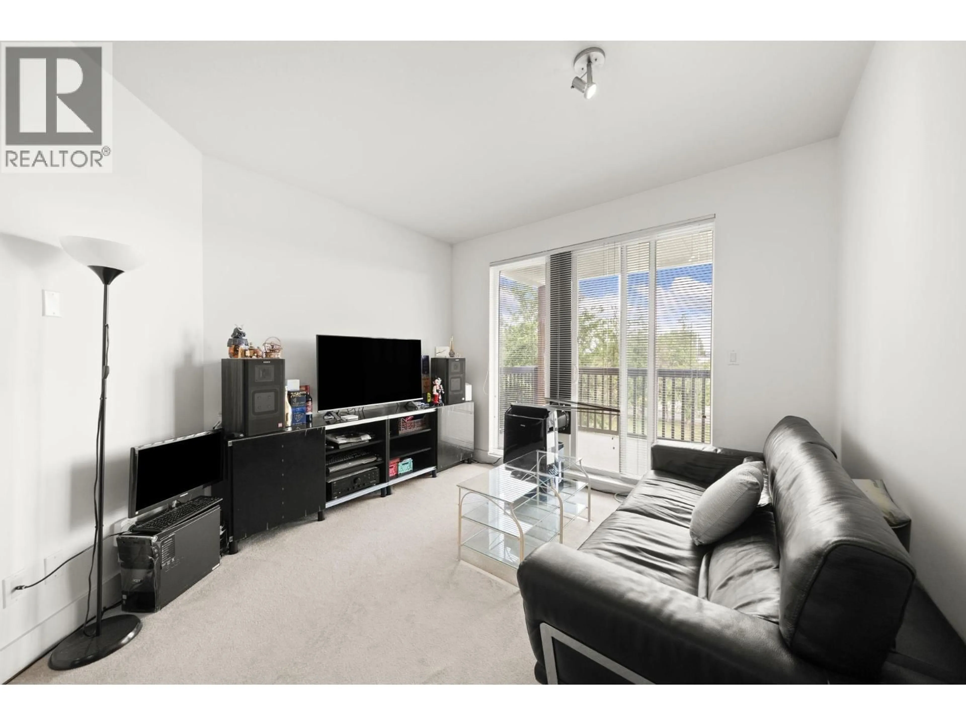 Living room with furniture, wood/laminate floor for 318 - 6033 KATSURA STREET, Richmond British Columbia V6Y0B3