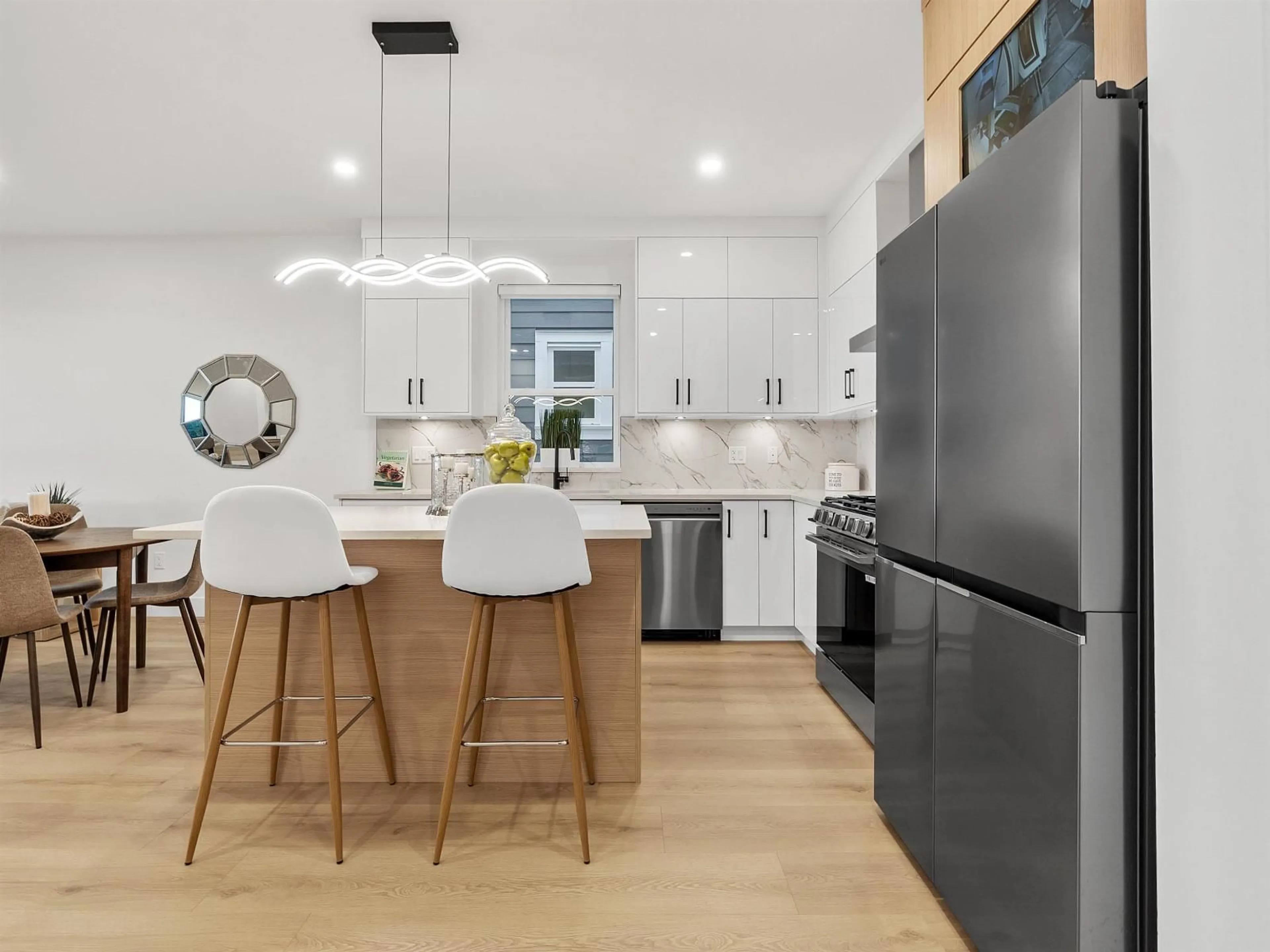 Open concept kitchen, unknown for 101 - 16693 16 AVENUE, Surrey British Columbia V3S0X7