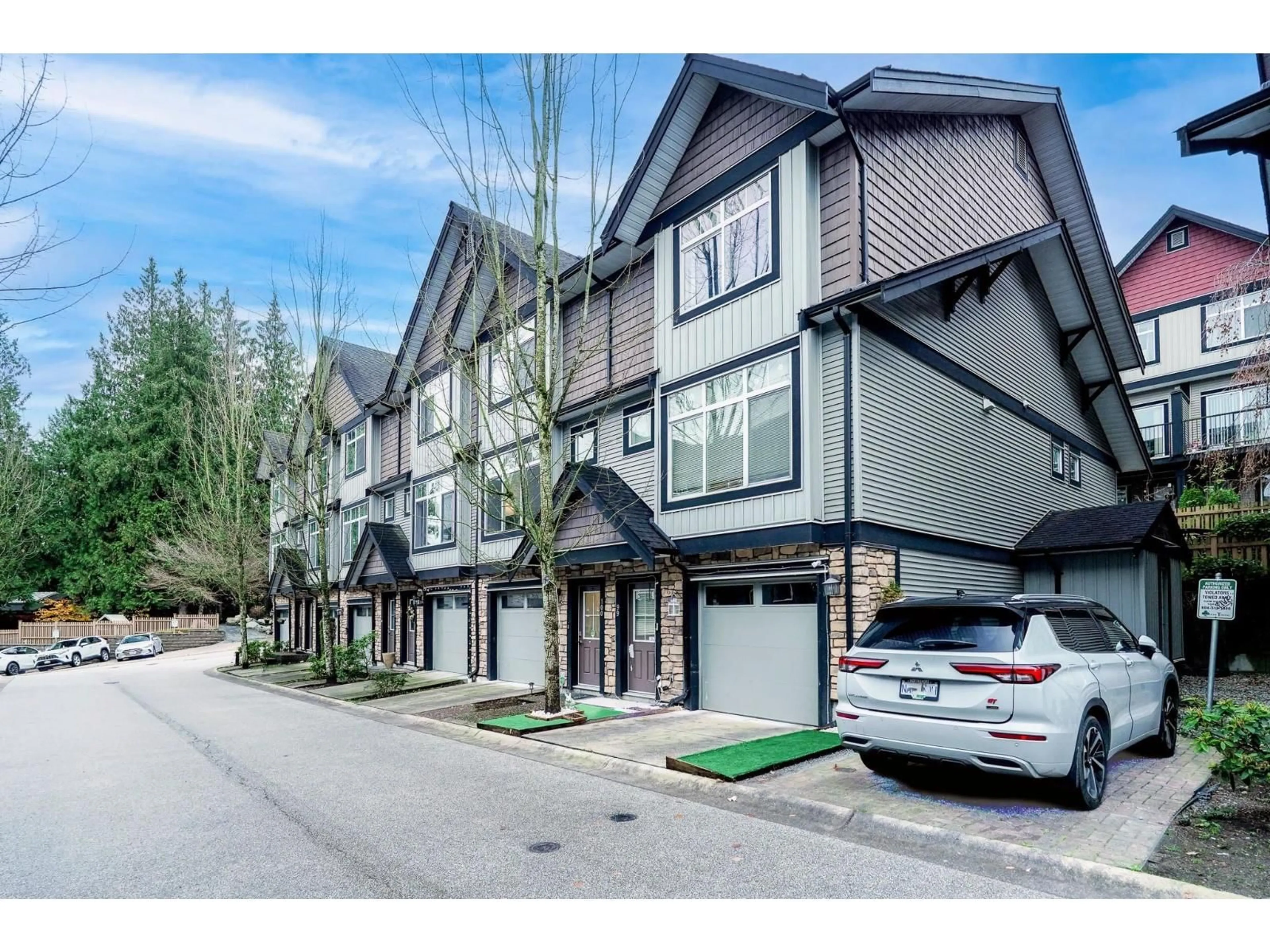 A pic from outside/outdoor area/front of a property/back of a property/a pic from drone, street for 100 - 6299 144 STREET, Surrey British Columbia V3X1A2