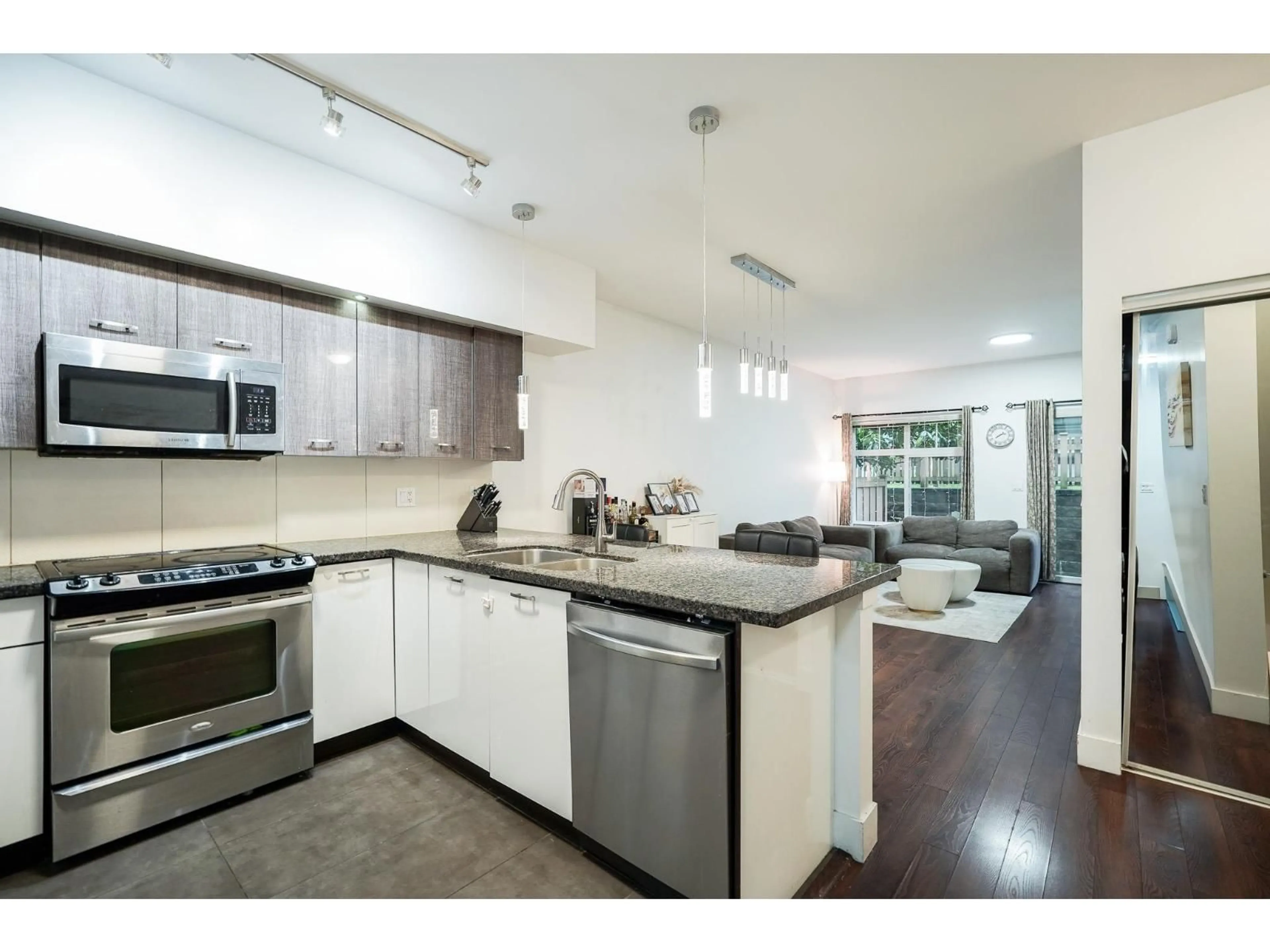 Open concept kitchen, unknown for 100 - 6299 144 STREET, Surrey British Columbia V3X1A2