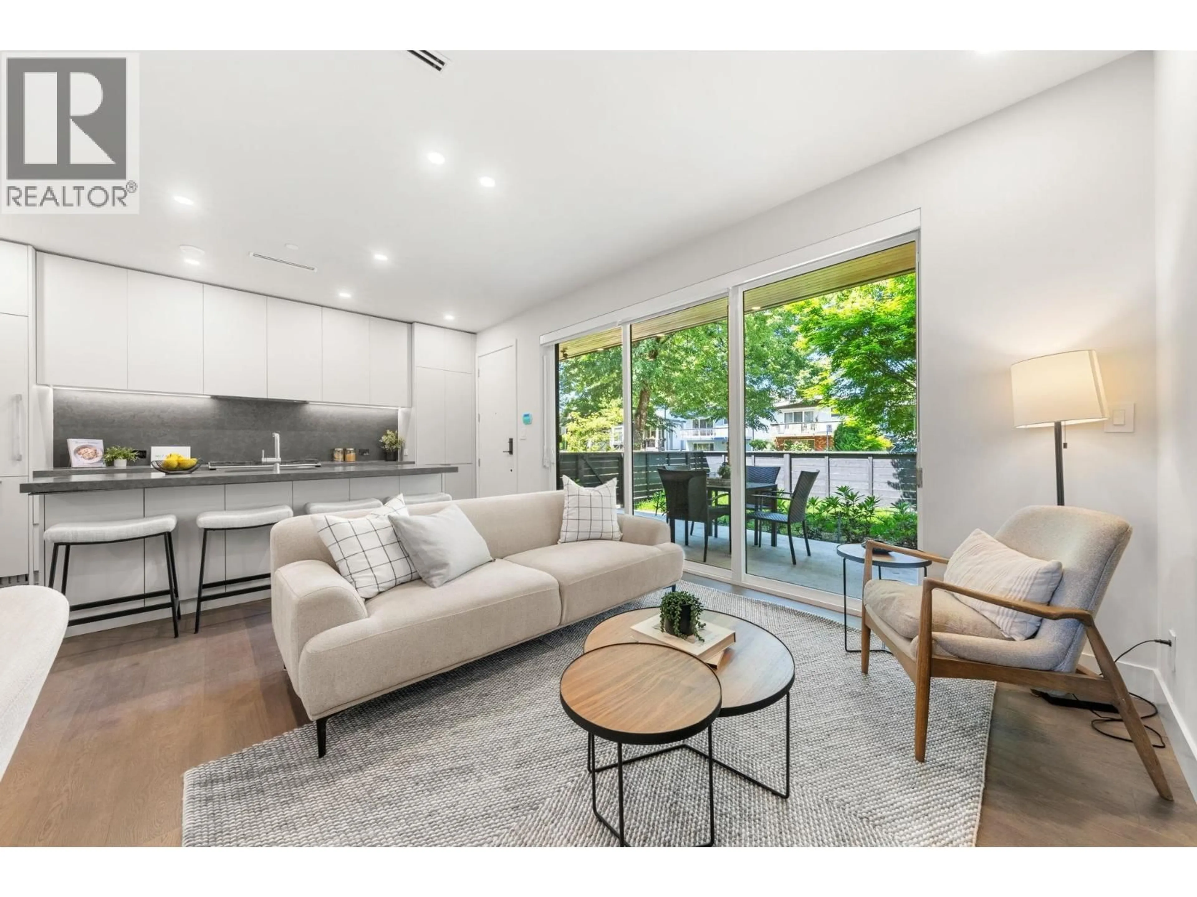 Living room with furniture, wood/laminate floor for 1 - 638 46TH AVENUE, Vancouver British Columbia V5W2A3