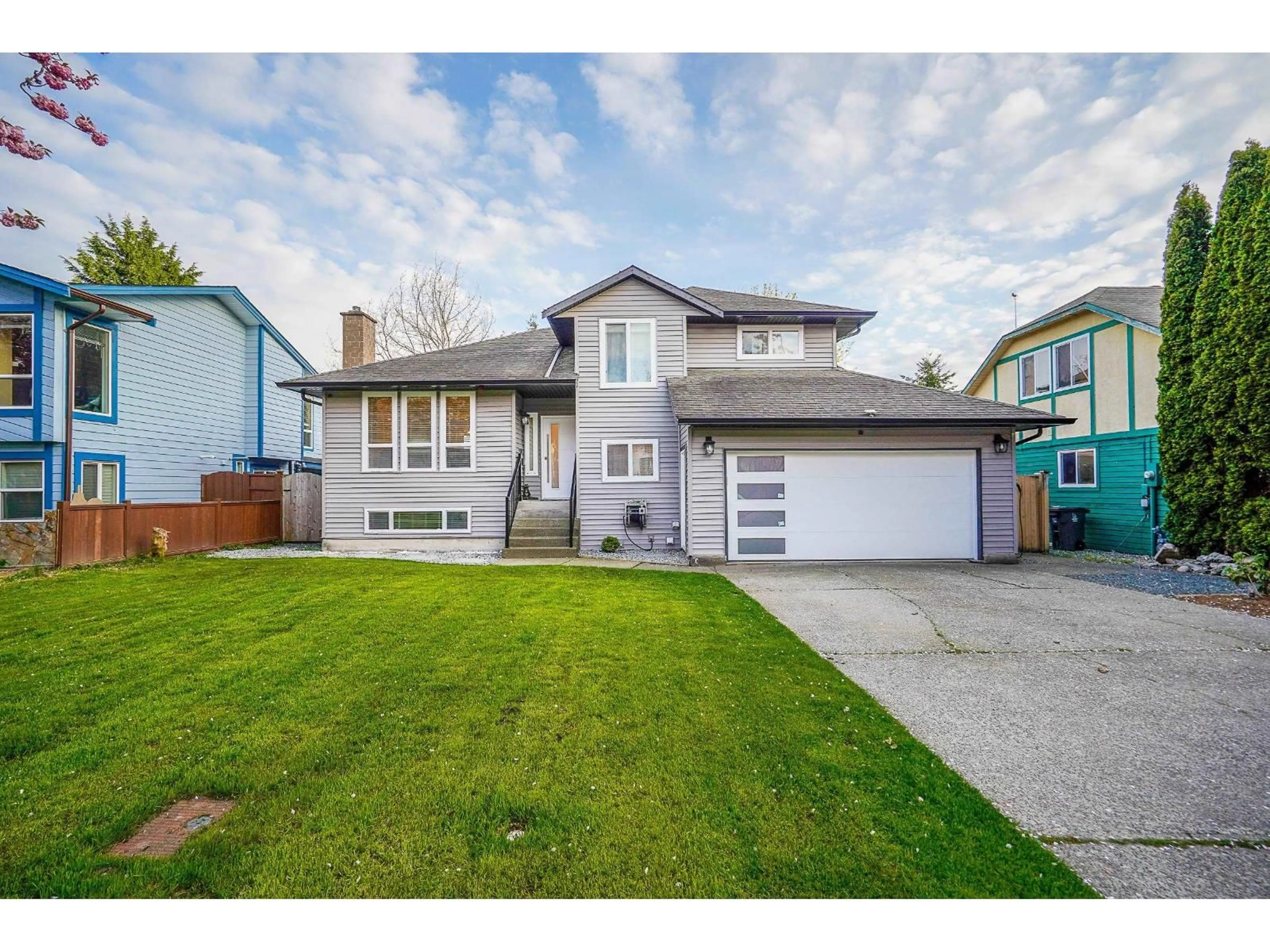 Home with vinyl exterior material, street for 15270 84A AVENUE, Surrey British Columbia V3S6H5