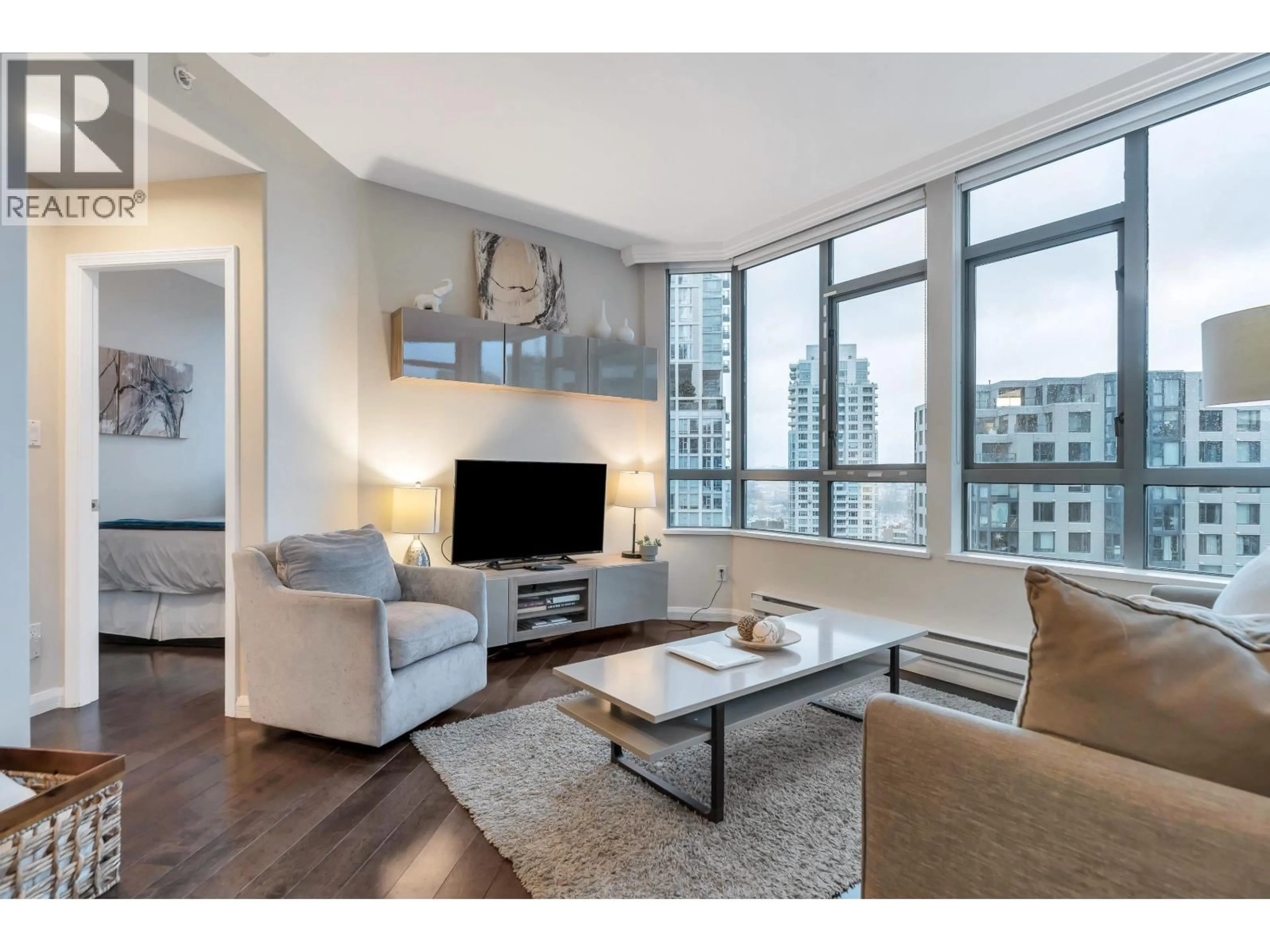 Living room with furniture, wood/laminate floor for 1306 - 1383 HOWE STREET, Vancouver British Columbia V6Z2R5