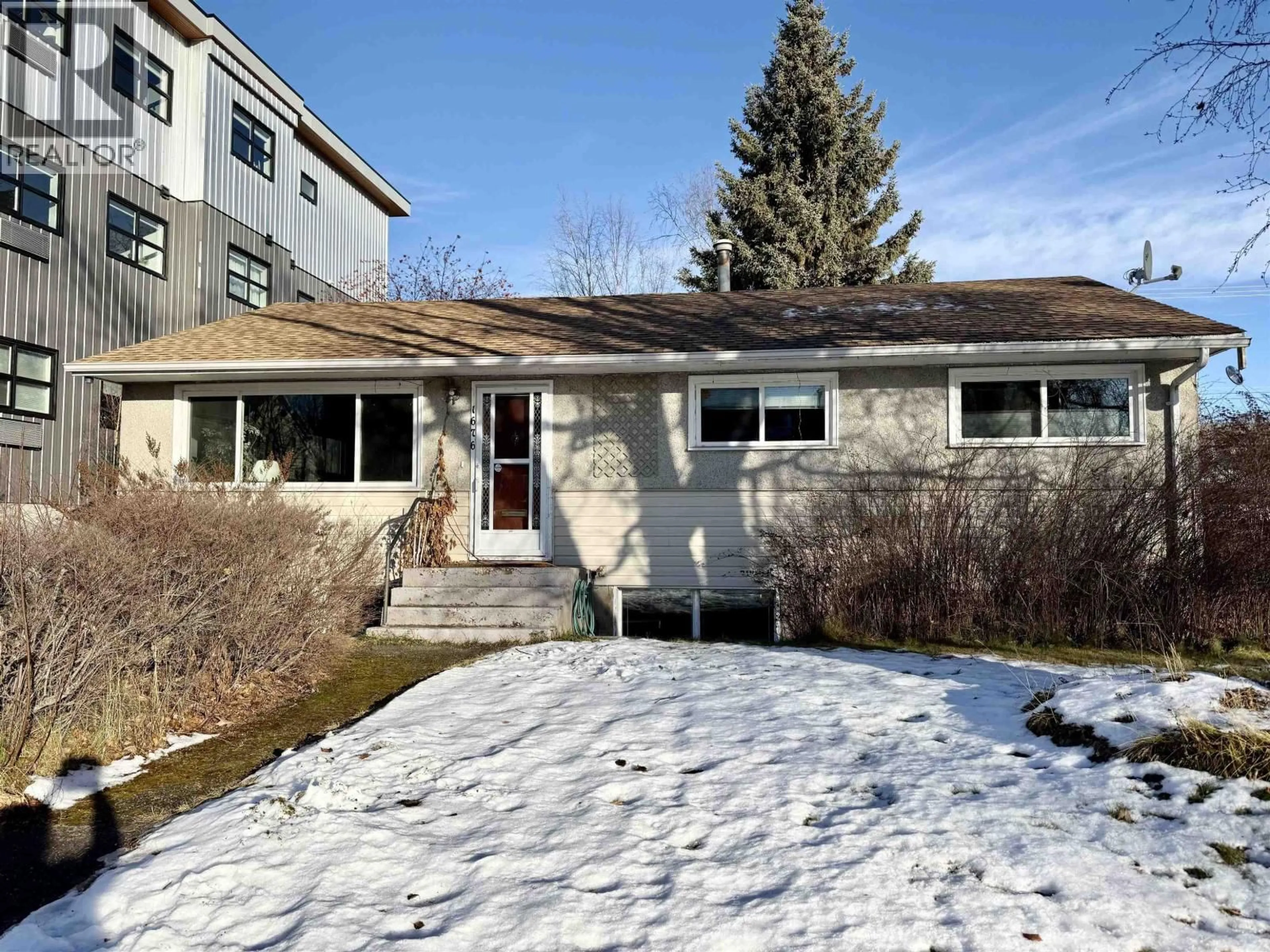 Home with vinyl exterior material, street for 1676 7TH AVENUE, Prince George British Columbia V2L3P6