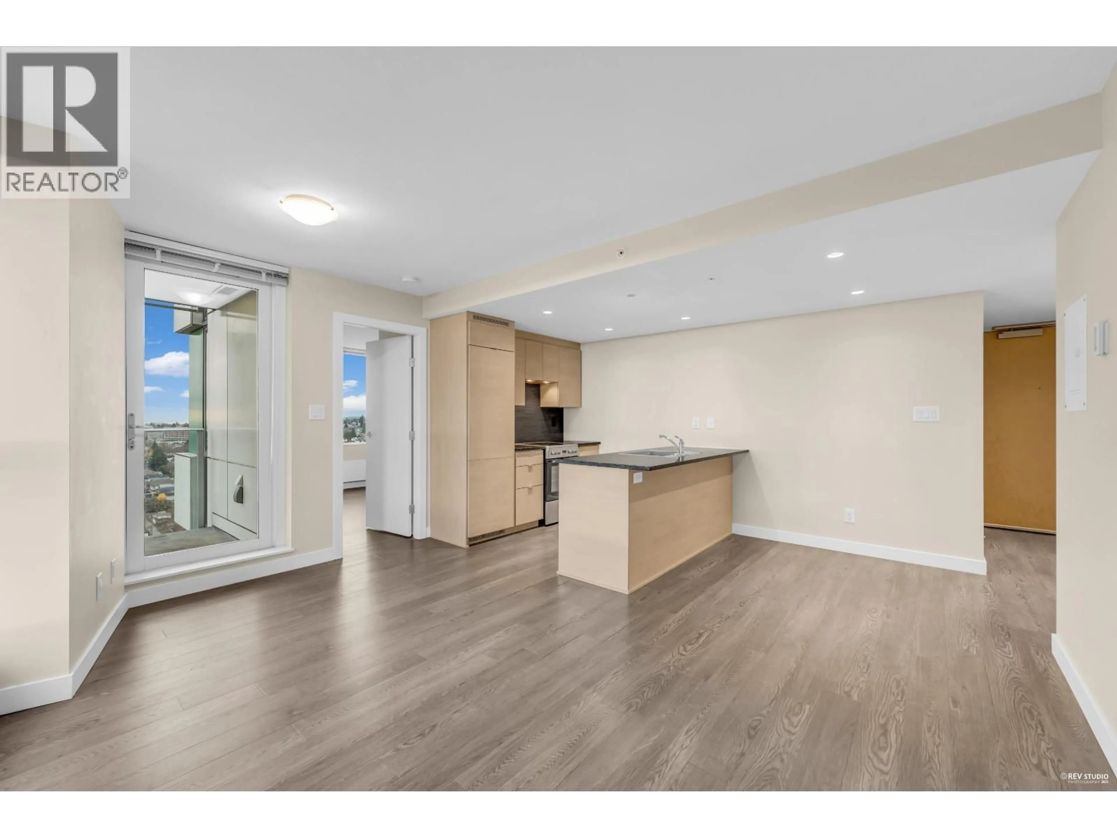Open concept kitchen, wood/laminate floor for 2503 - 489 INTERURBAN WAY, Vancouver British Columbia V5X0C7
