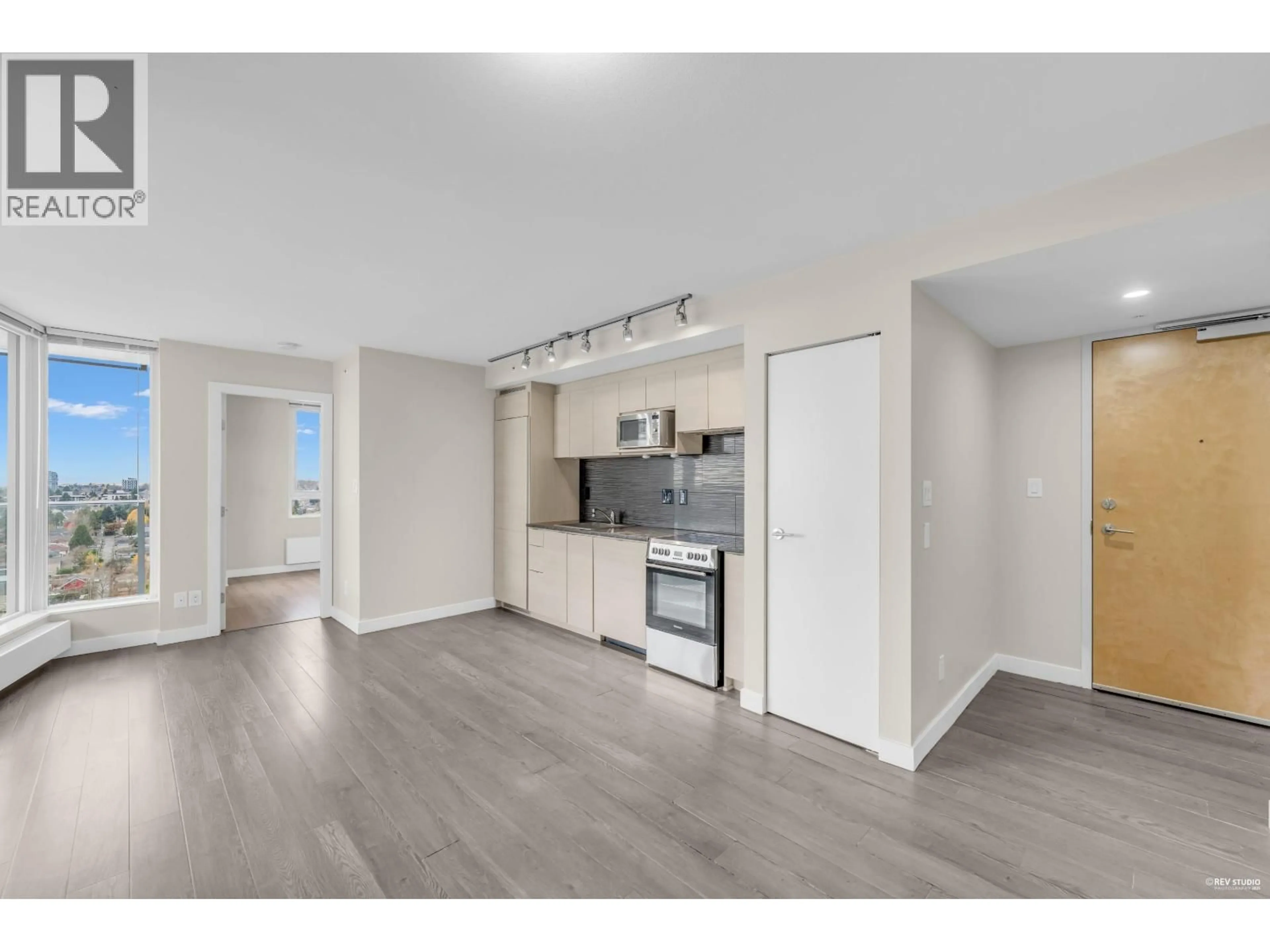 Open concept kitchen, wood/laminate floor for 2203 - 488 MARINE DRIVE, Vancouver British Columbia V5X0C6