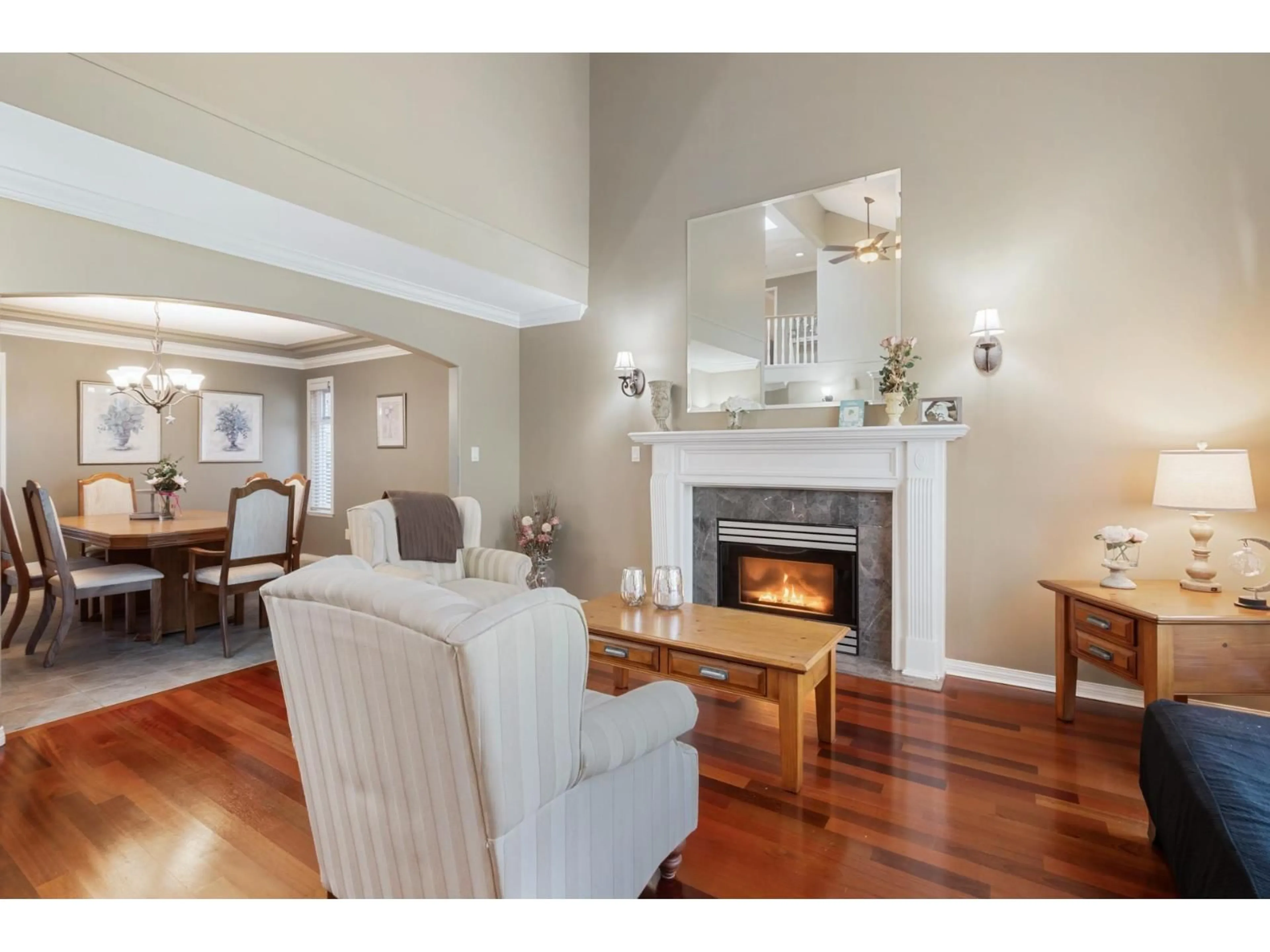 Living room with furniture, wood/laminate floor for 10118 171A STREET, Surrey British Columbia V4N3L3