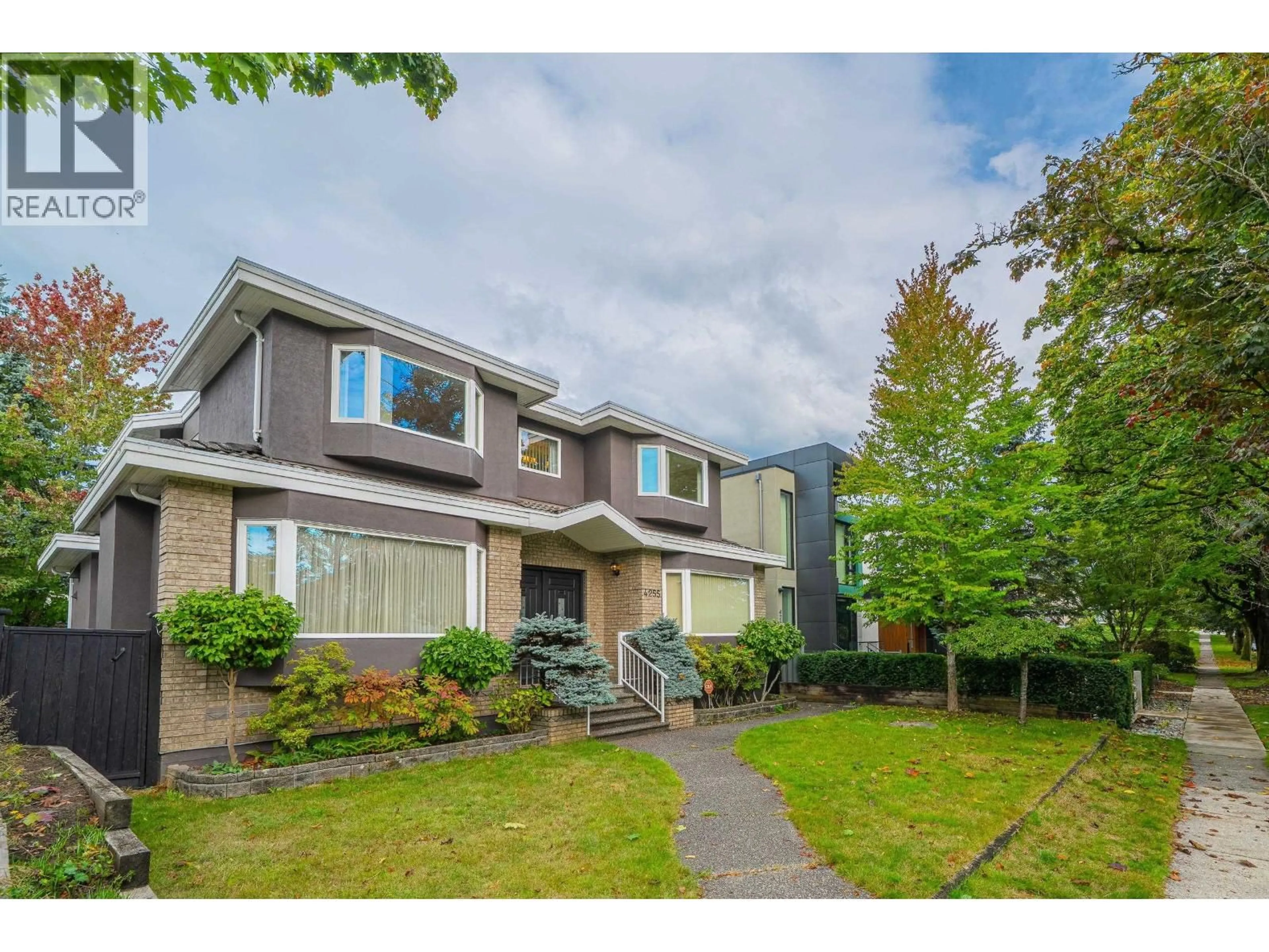 Home with vinyl exterior material, street for 4255 15TH AVENUE, Vancouver British Columbia V6R3A7