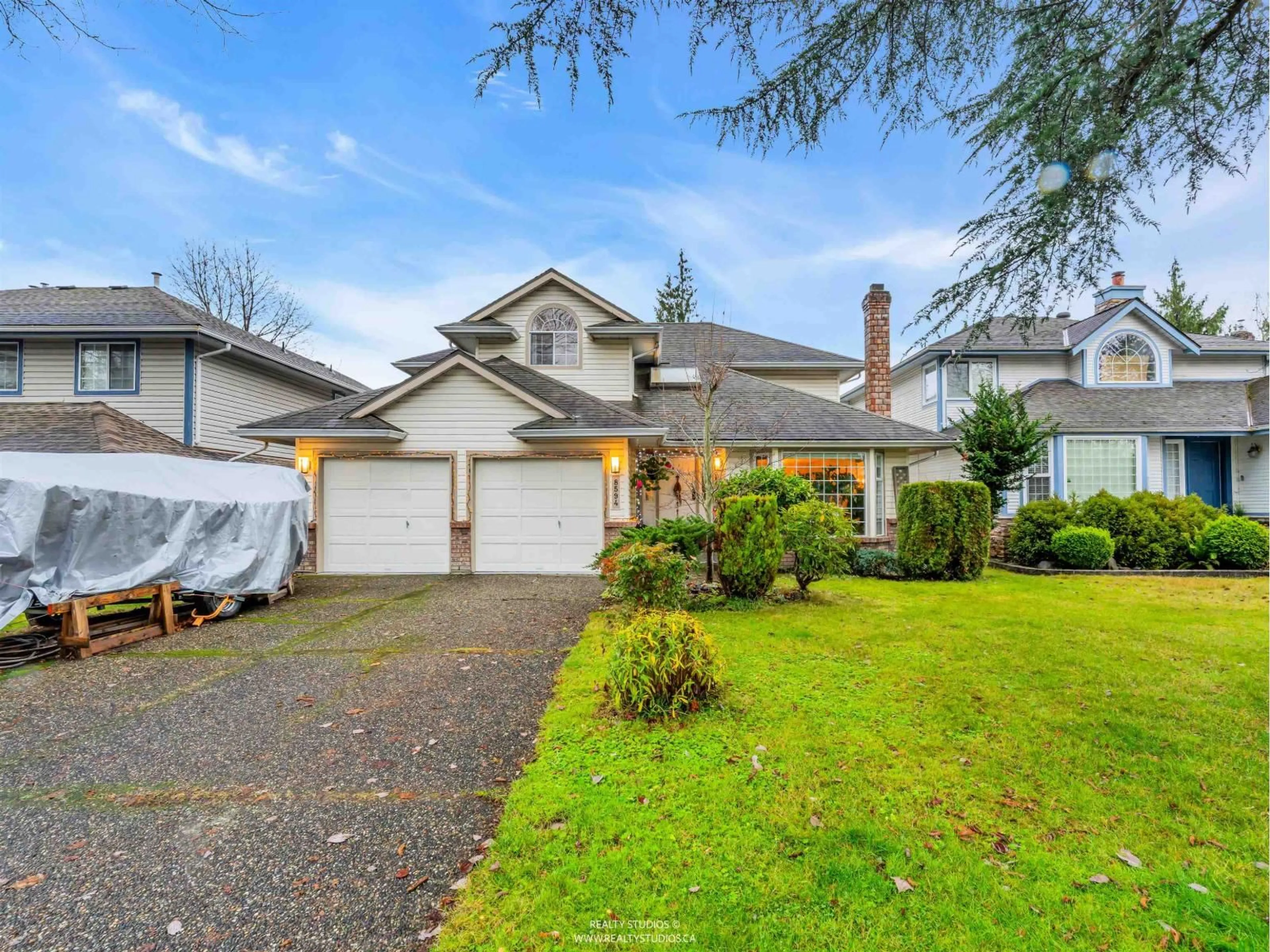 Home with vinyl exterior material, street for 8594 212 STREET, Langley British Columbia V1M2E7