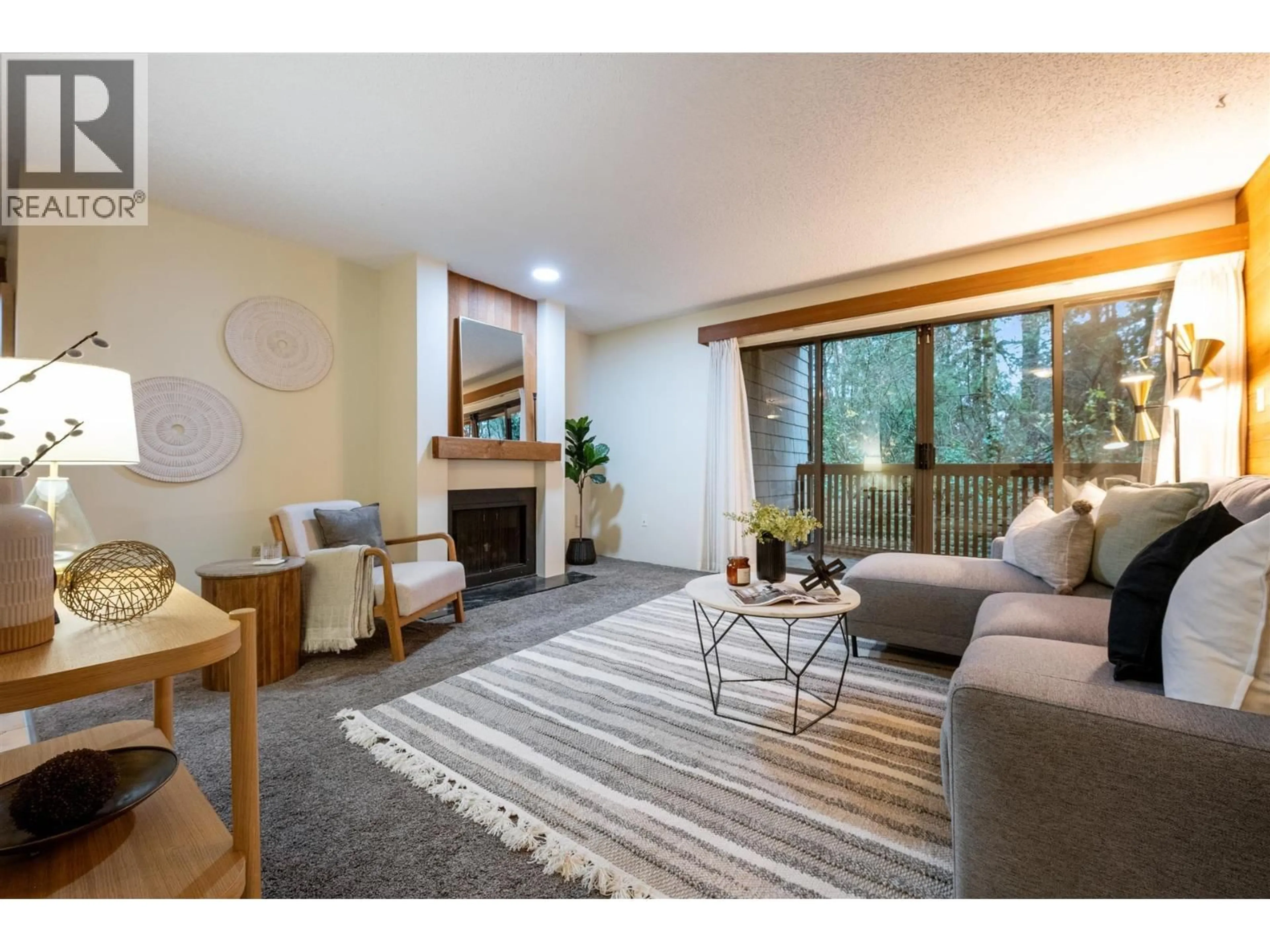 Living room with furniture, wood/laminate floor for 220 - 7377 SALISBURY AVENUE, Burnaby British Columbia V5E4B2