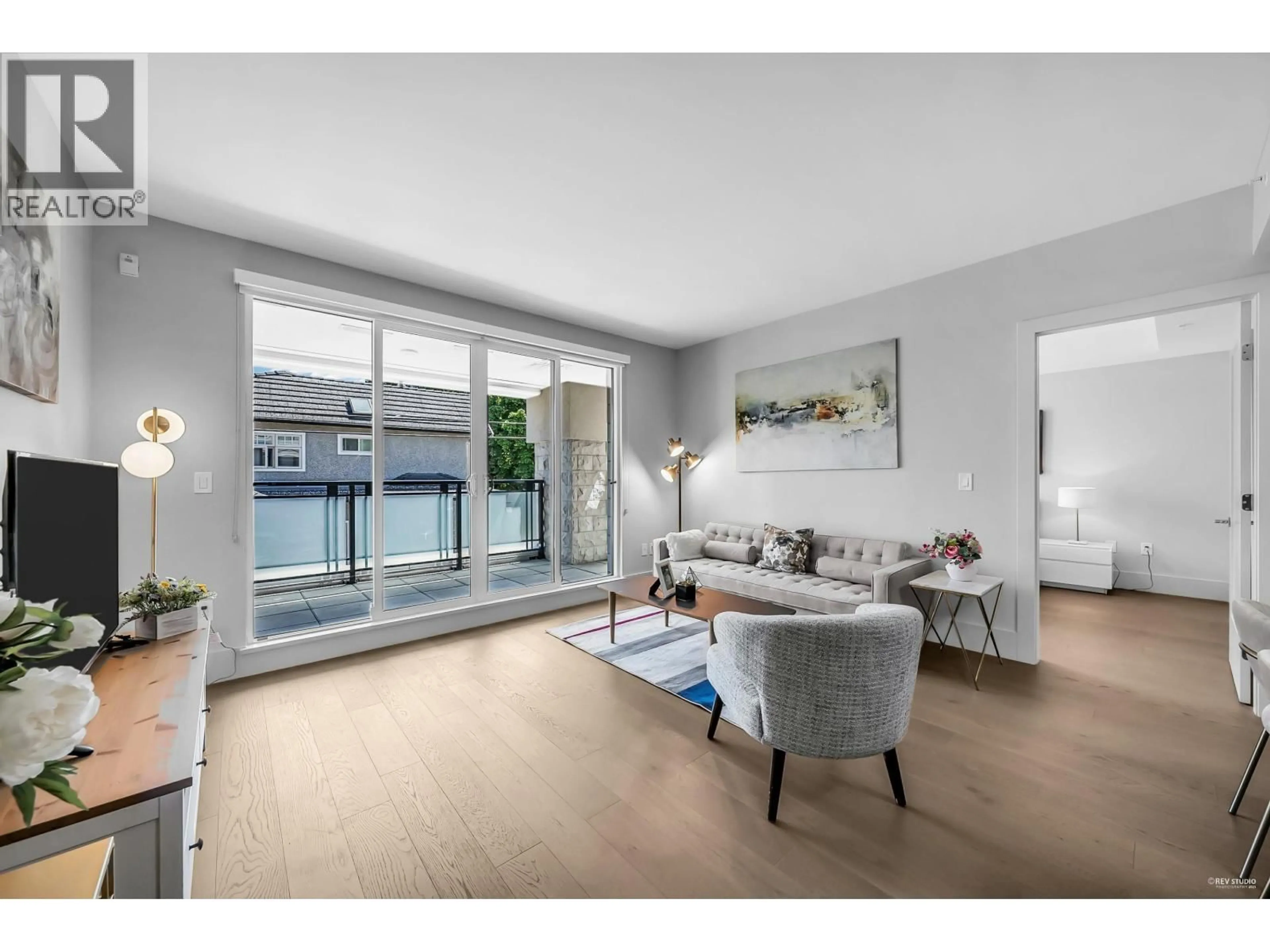 Living room with furniture, unknown for 204 - 2089 43RD AVENUE, Vancouver British Columbia V6M2C8