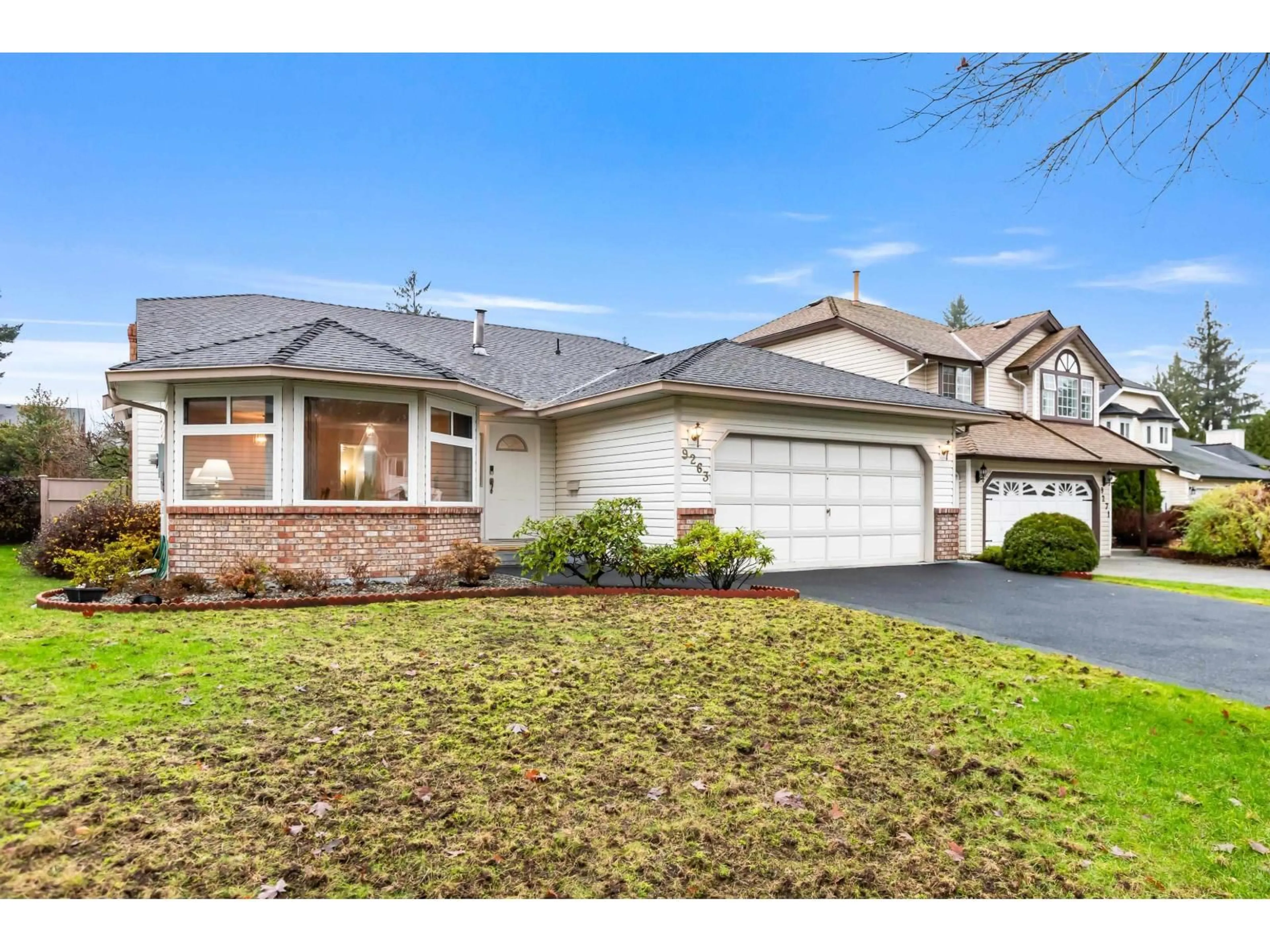 Home with vinyl exterior material, street for 9263 156A STREET, Surrey British Columbia V4N3B1