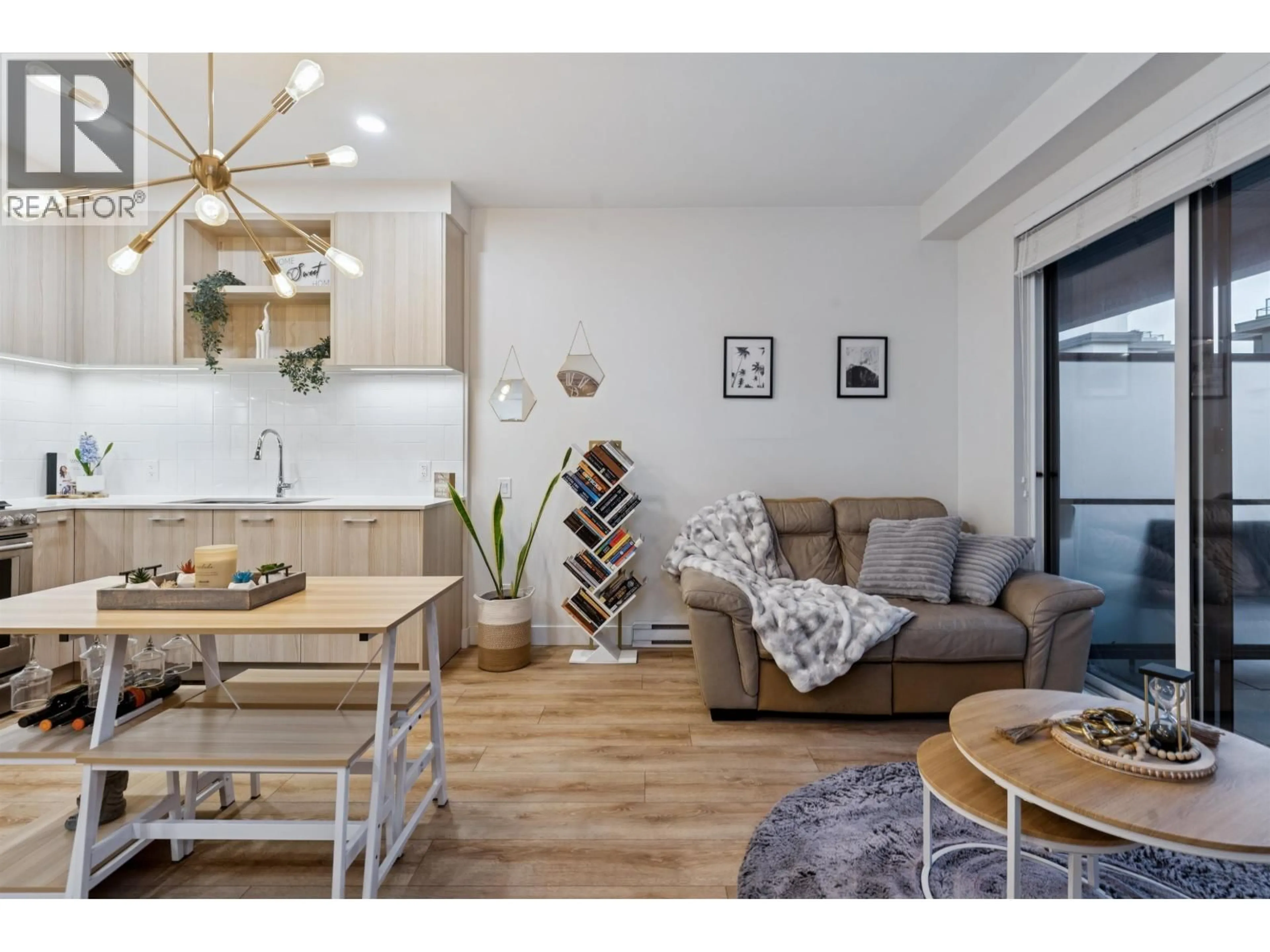 Living room with furniture, wood/laminate floor for 225 - 721 ANSKAR COURT, Coquitlam British Columbia V3J0L4