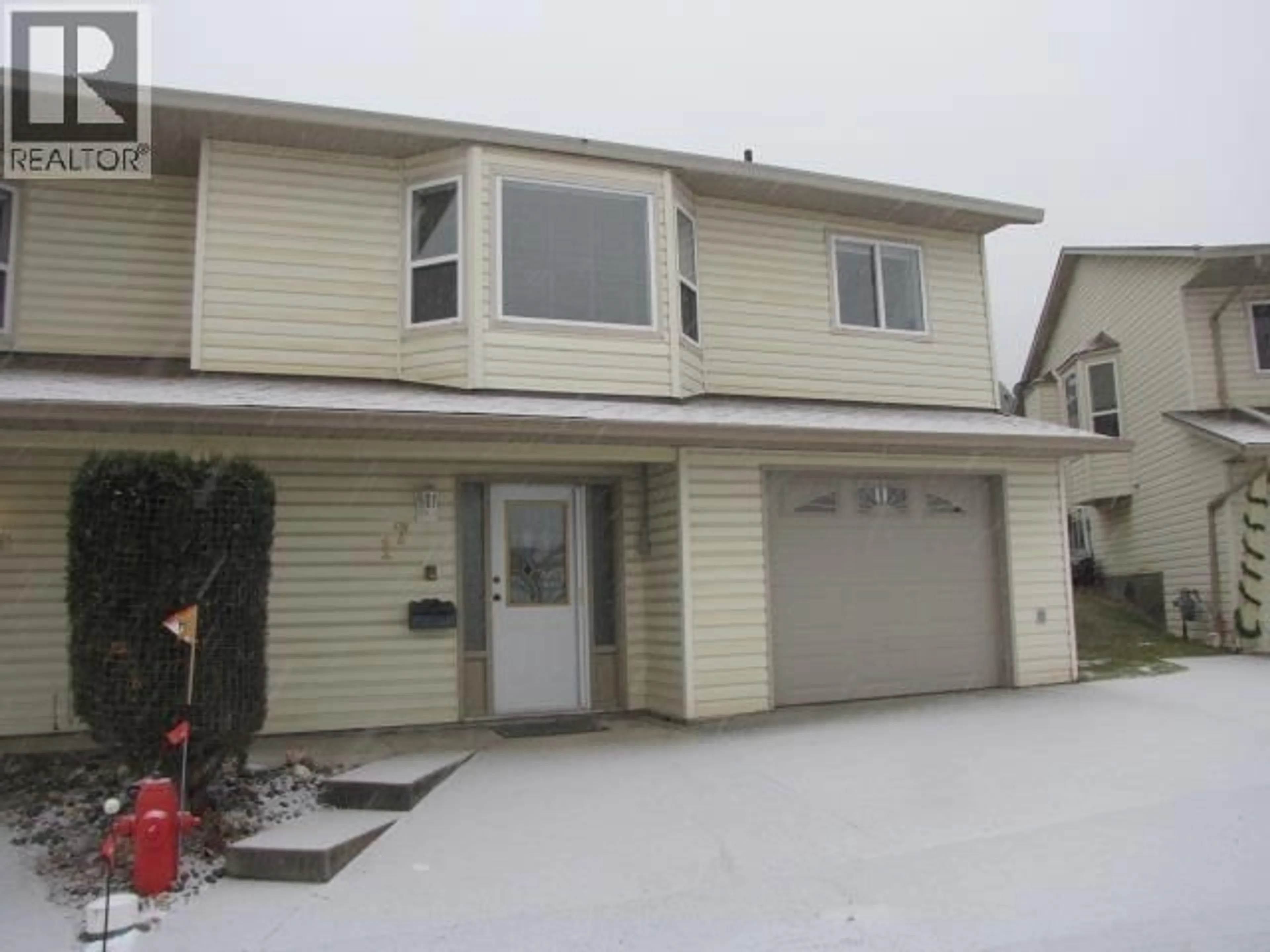 Home with vinyl exterior material, street for 17 - 500 WOTZKE DRIVE, Williams Lake British Columbia V2G4S9