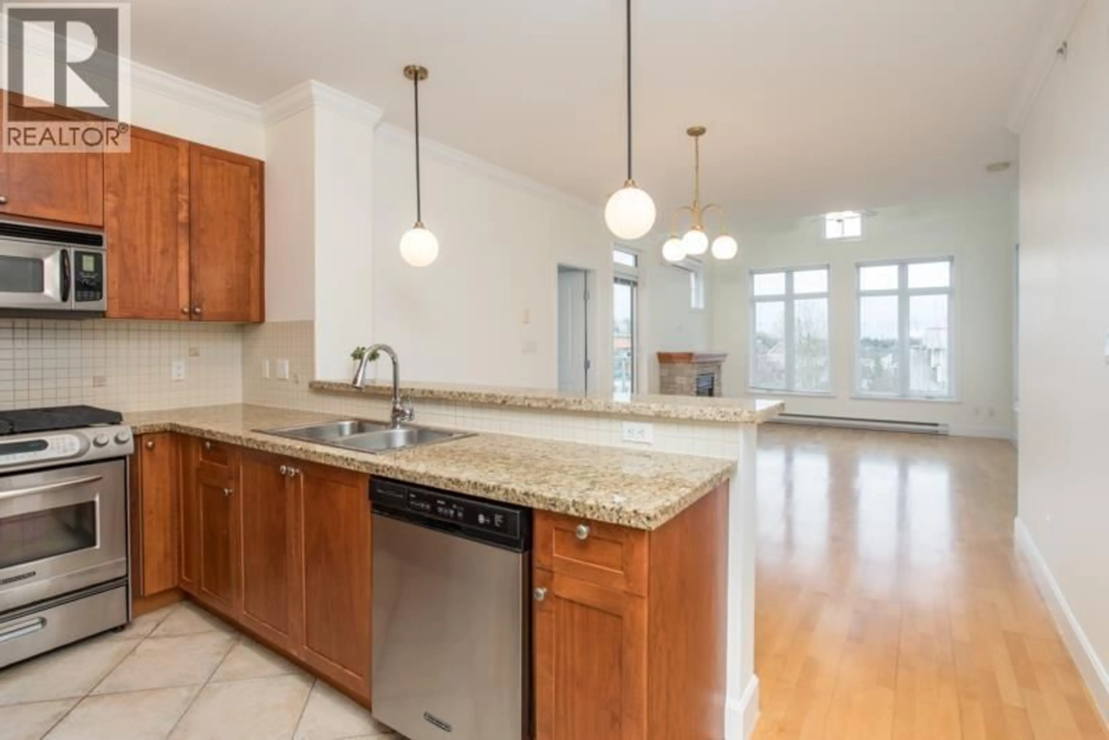 Open concept kitchen, ceramic/tile floor for 425 - 4280 MONCTON STREET, Richmond British Columbia V7E6T4