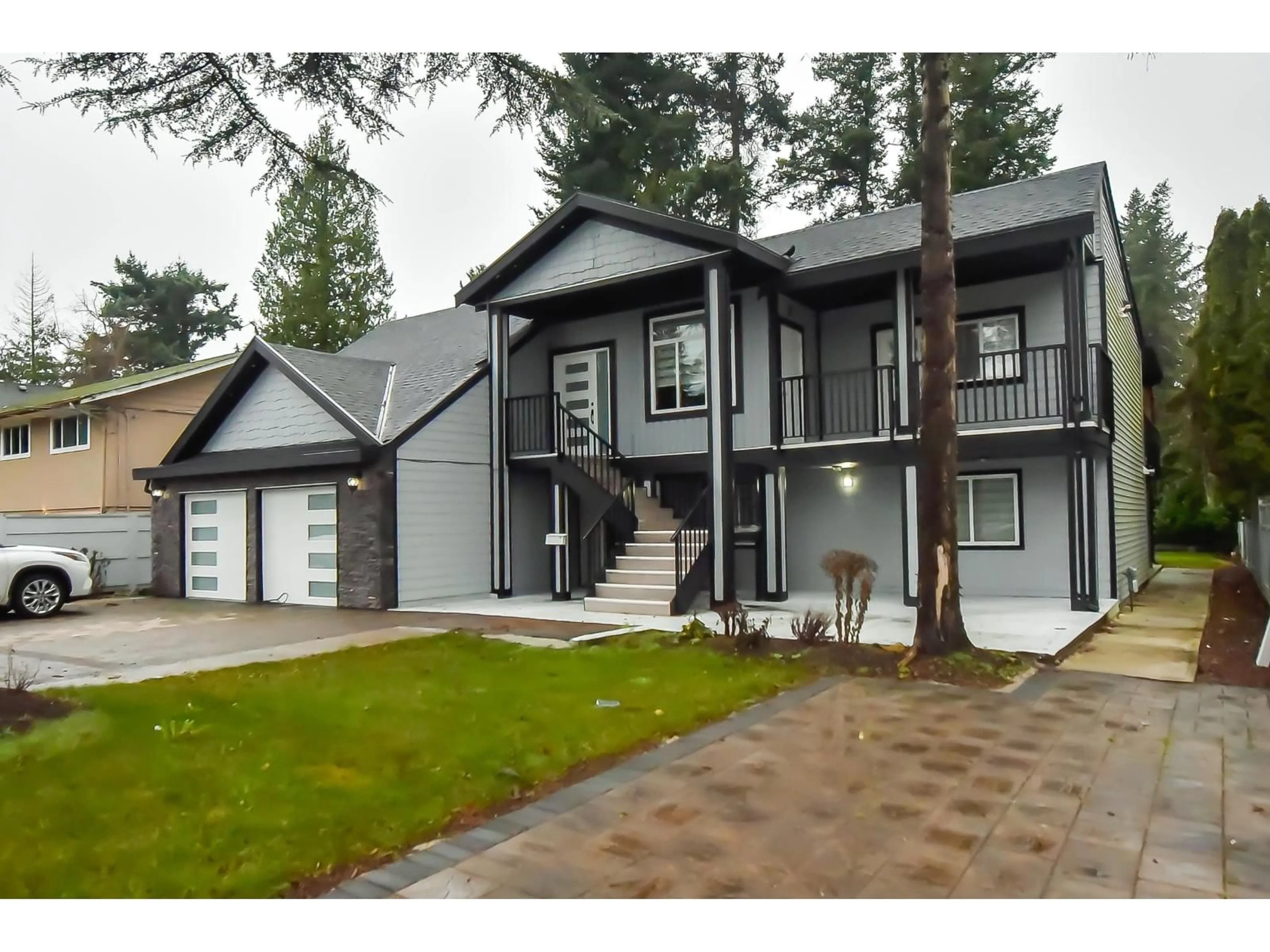 Home with vinyl exterior material, street for 1675 136 STREET, Surrey British Columbia V4A4E3