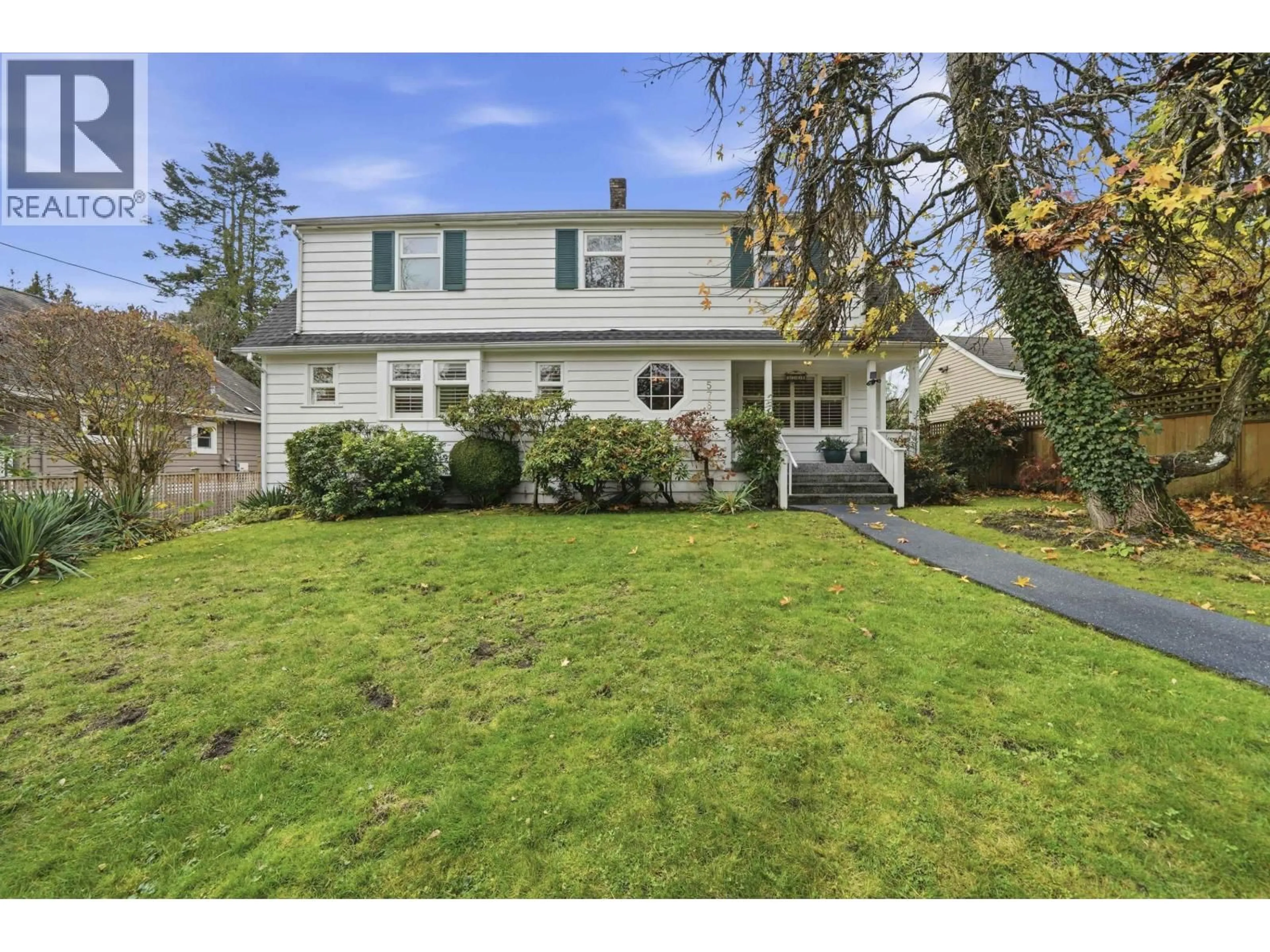 Home with vinyl exterior material, street for 5761 HOLLAND STREET, Vancouver British Columbia V6N2A9