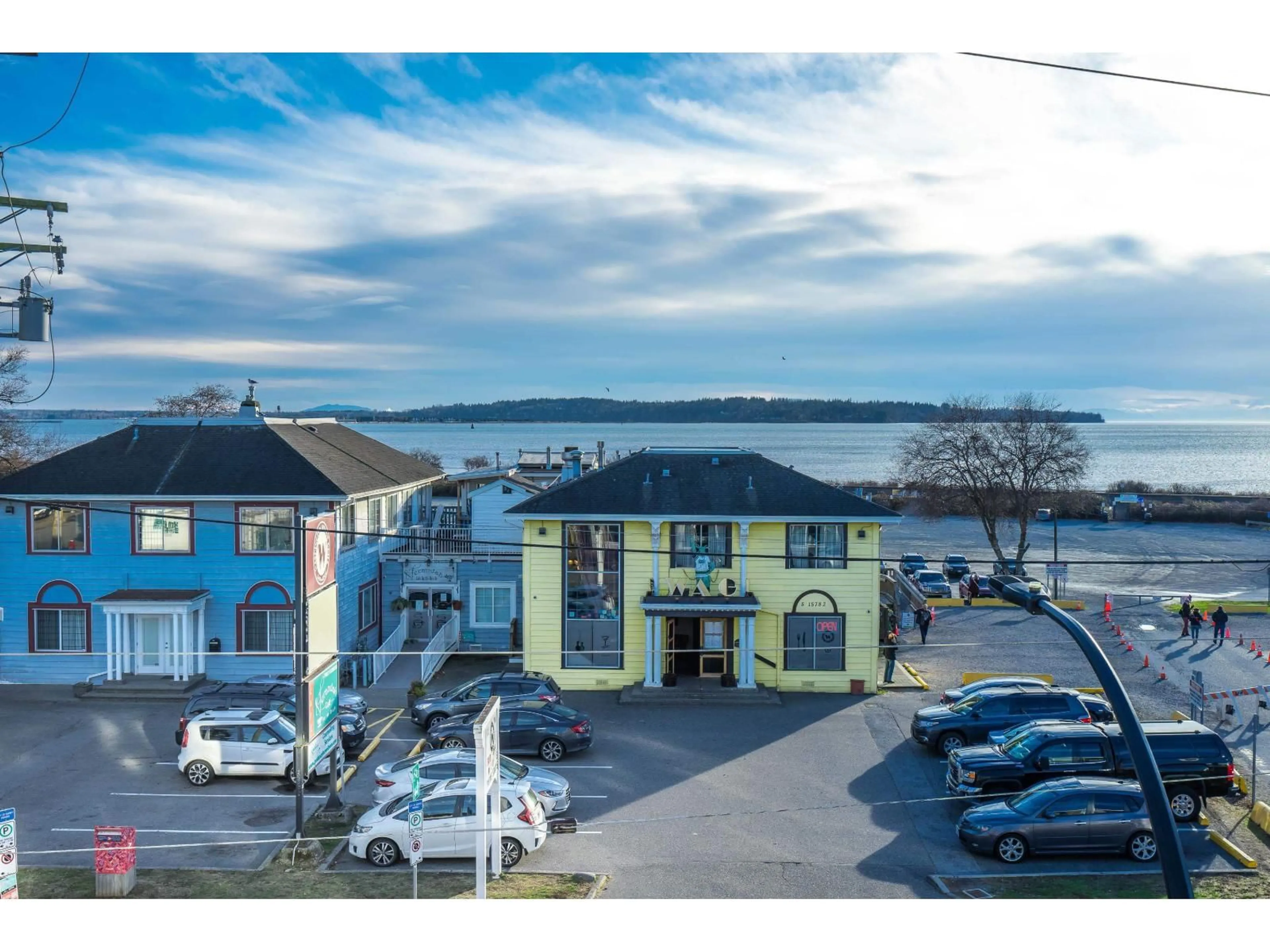 A pic from outside/outdoor area/front of a property/back of a property/a pic from drone, water/lake/river/ocean view for 204 - 15777 MARINE DRIVE, Surrey British Columbia V4B1E5