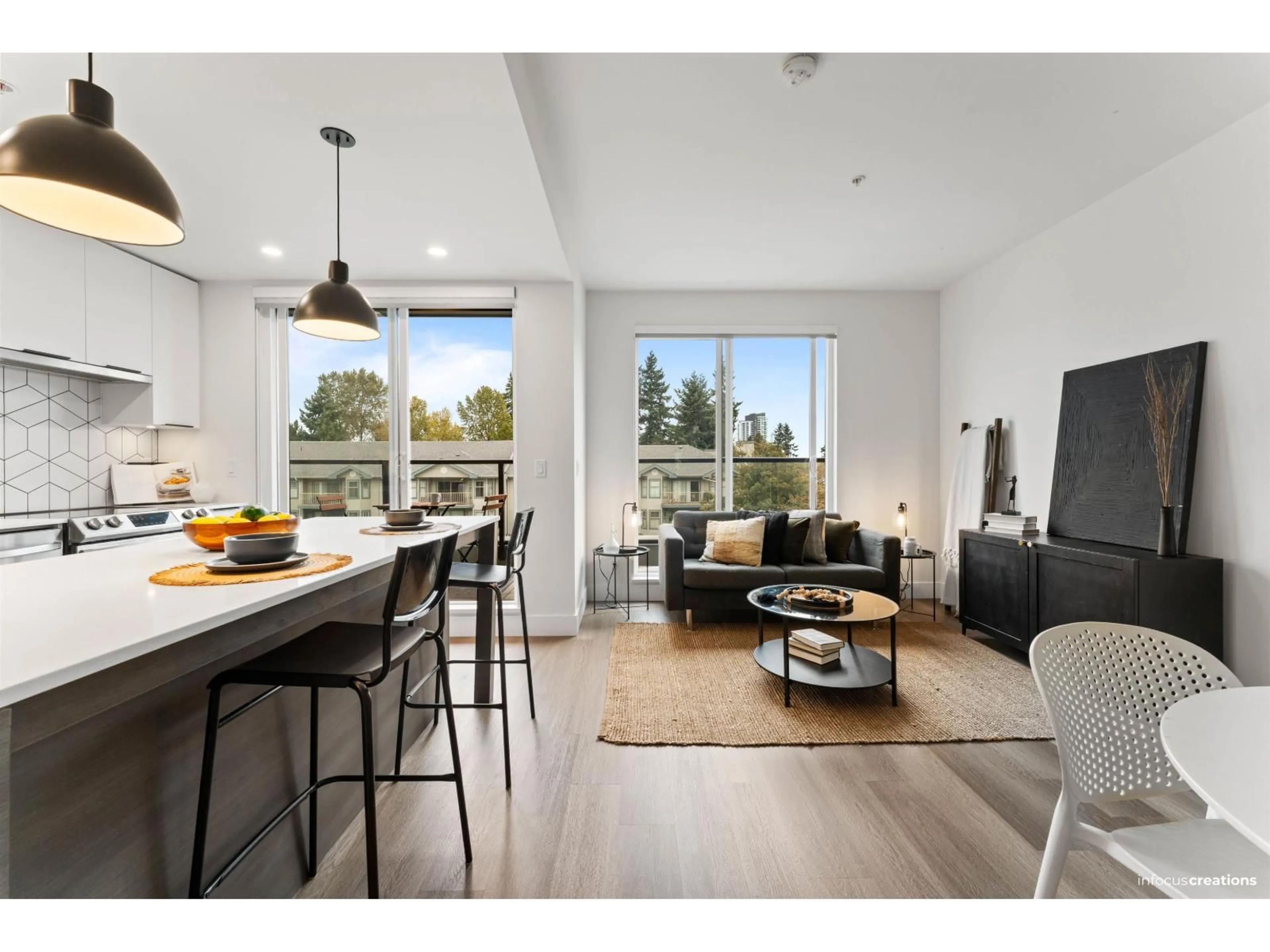 Open concept kitchen, wood/laminate floor for 403 - 10778 138 STREET, Surrey British Columbia V3T0S5