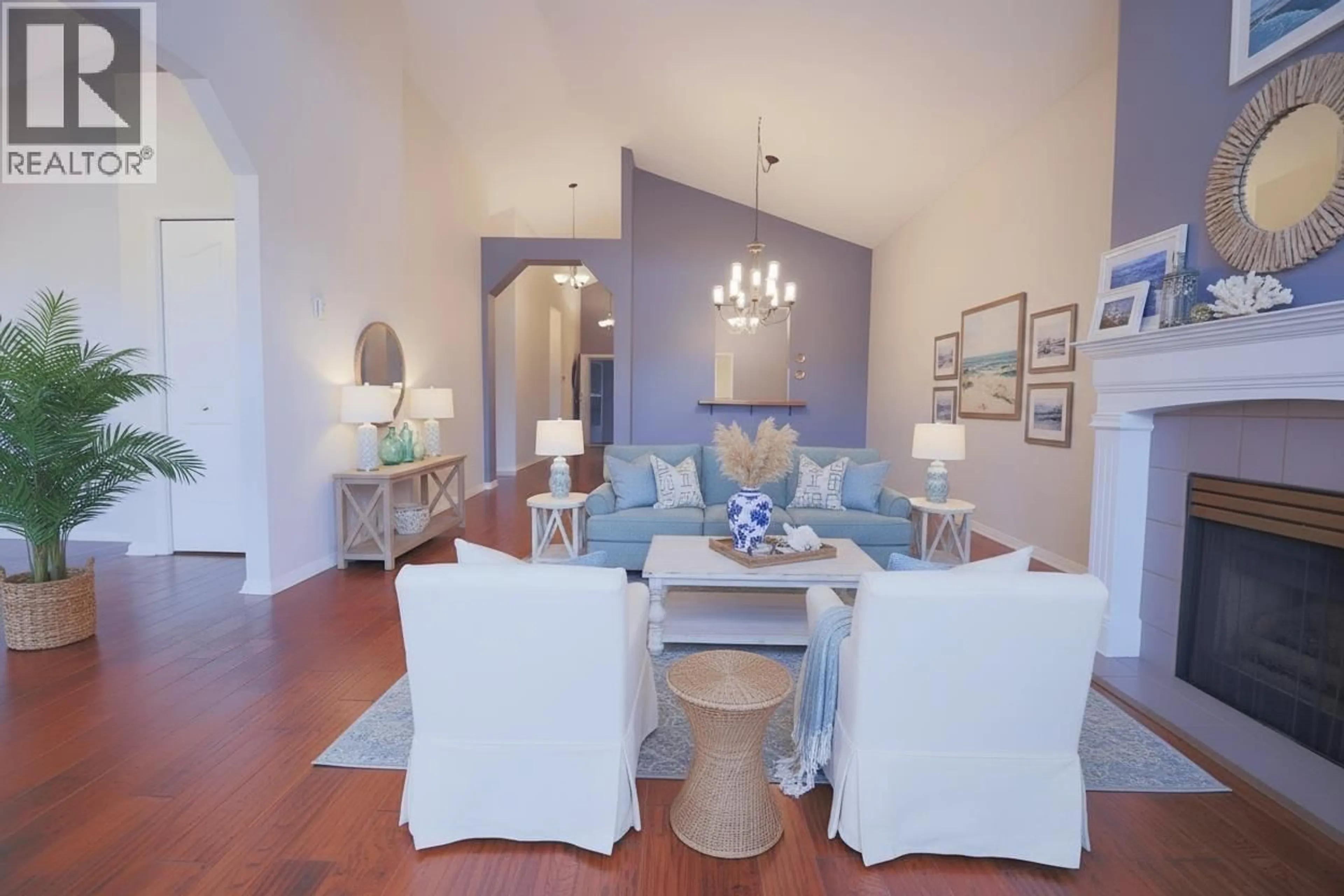 Living room with furniture, wood/laminate floor for 321 - 4955 RIVER ROAD, Delta British Columbia V4K4V9