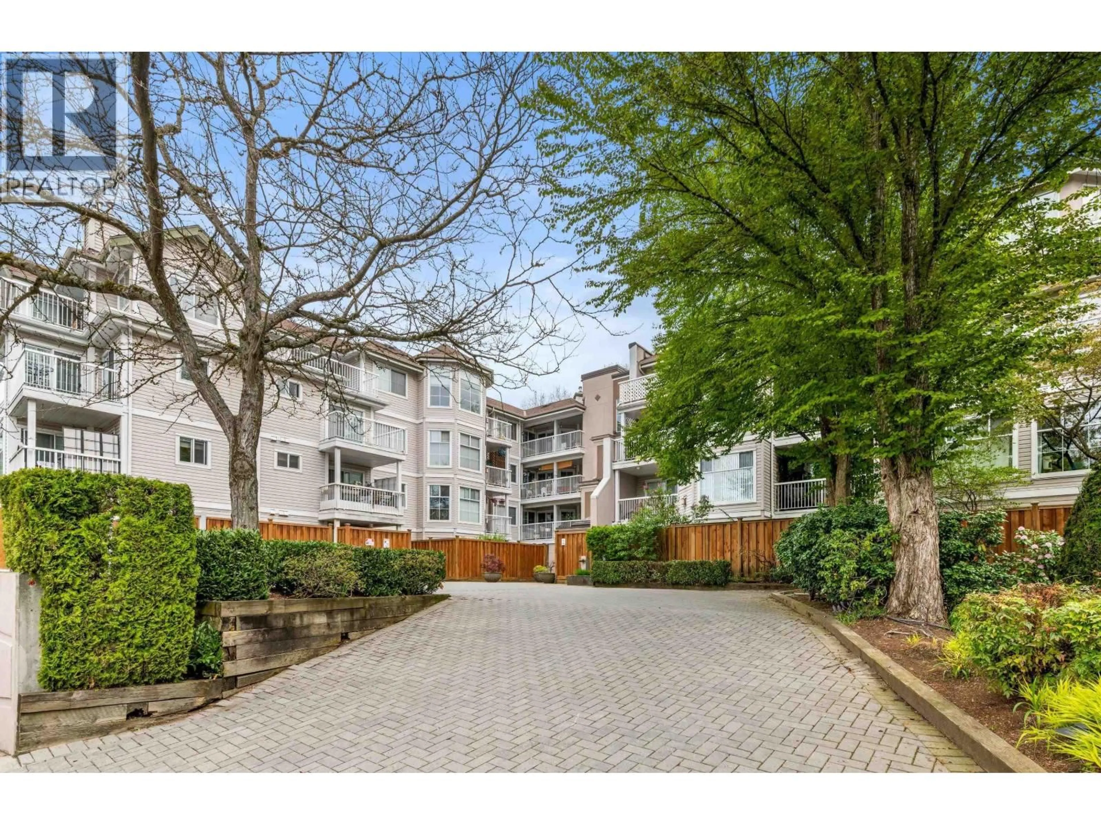 A pic from outside/outdoor area/front of a property/back of a property/a pic from drone, street for 401 - 2678 DIXON STREET, Port Coquitlam British Columbia V3C6L7