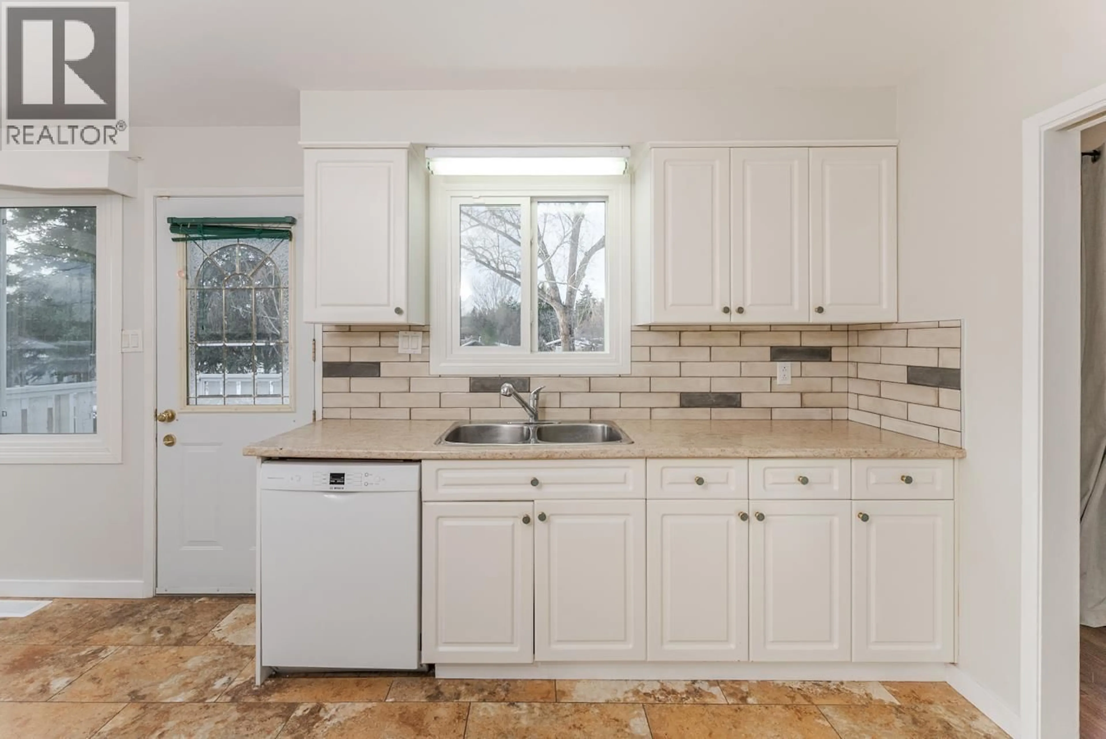 Standard kitchen, ceramic/tile floor for 2425 EWERT CRESCENT, Prince George British Columbia V2M2S1