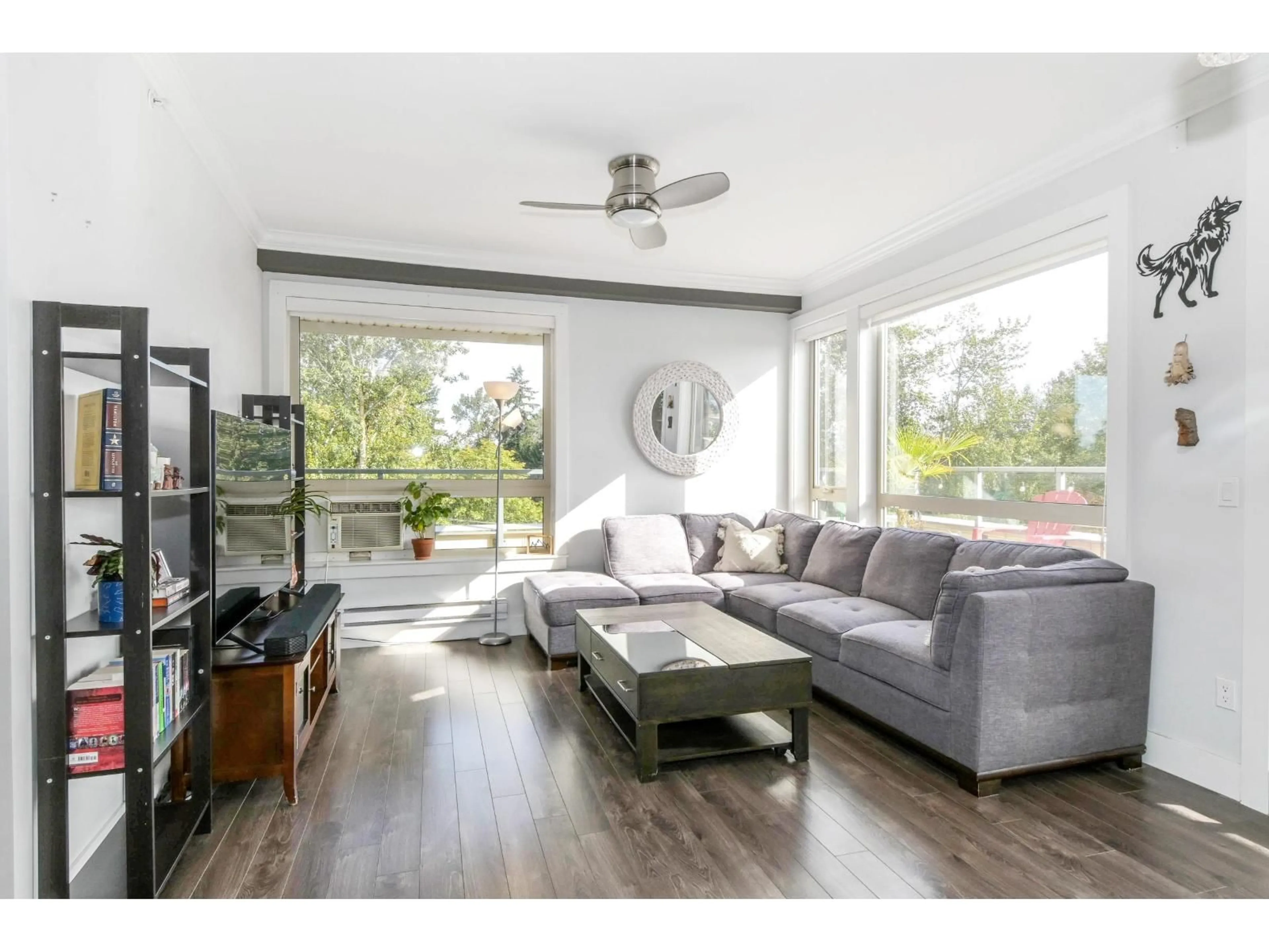 Living room with furniture, wood/laminate floor for 503 - 19228 64 AVENUE, Surrey British Columbia V3S7C9
