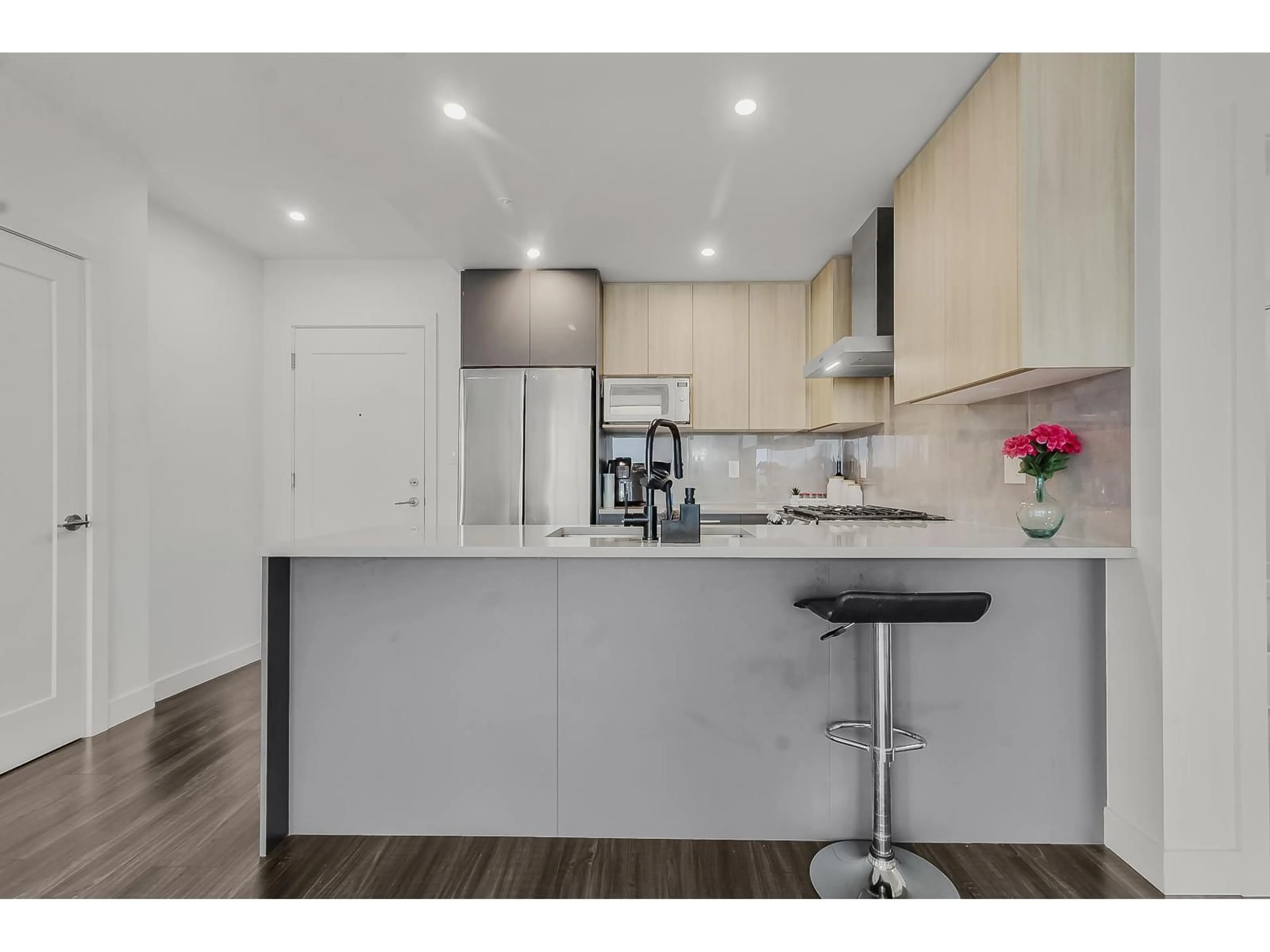 Open concept kitchen, wood/laminate floor for 206 - 31900 RAVEN AVENUE, Mission British Columbia V2V0H5