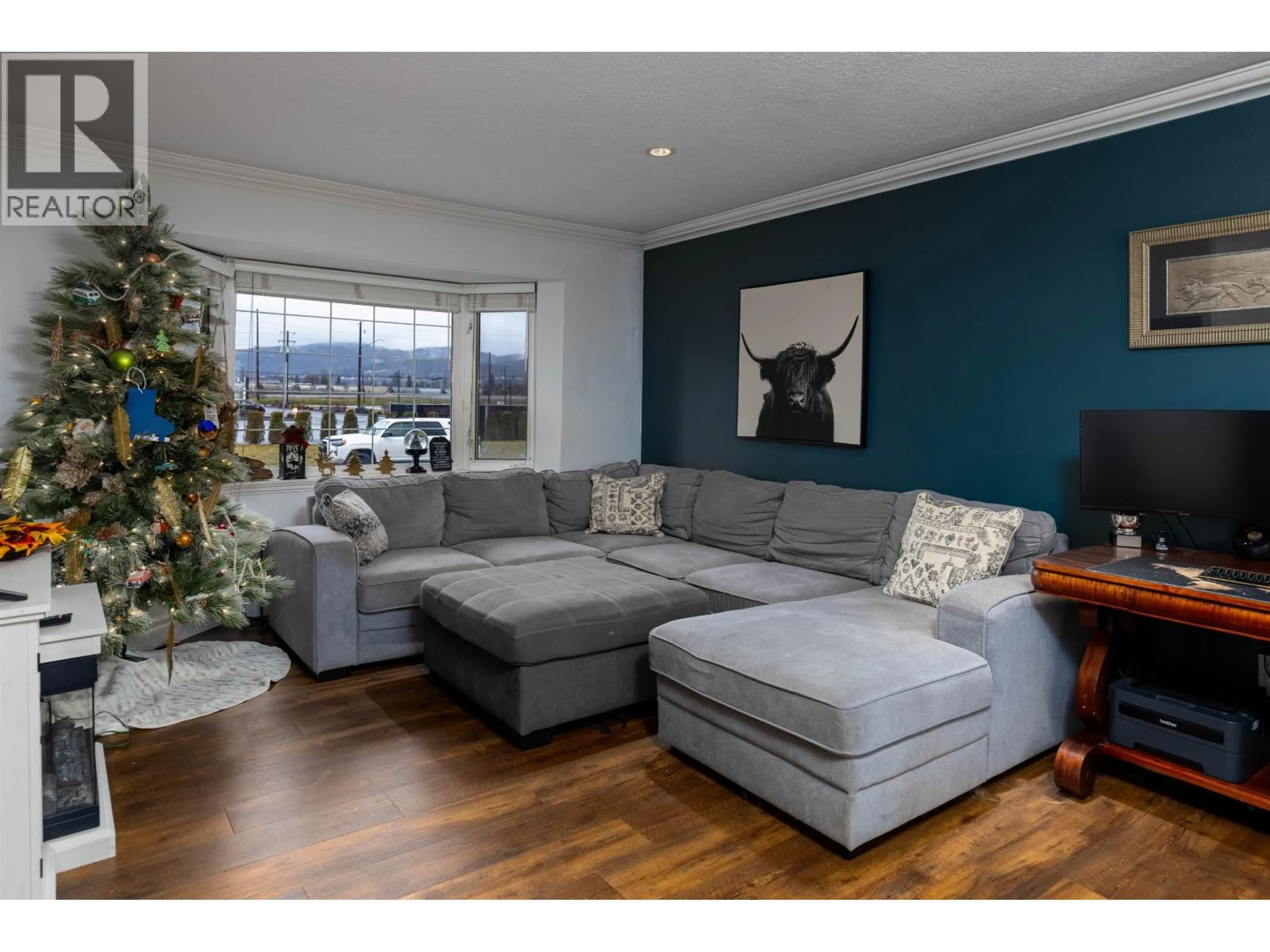 Living room with furniture, wood/laminate floor for 4813 POHLE AVENUE, Terrace British Columbia V8G1J4