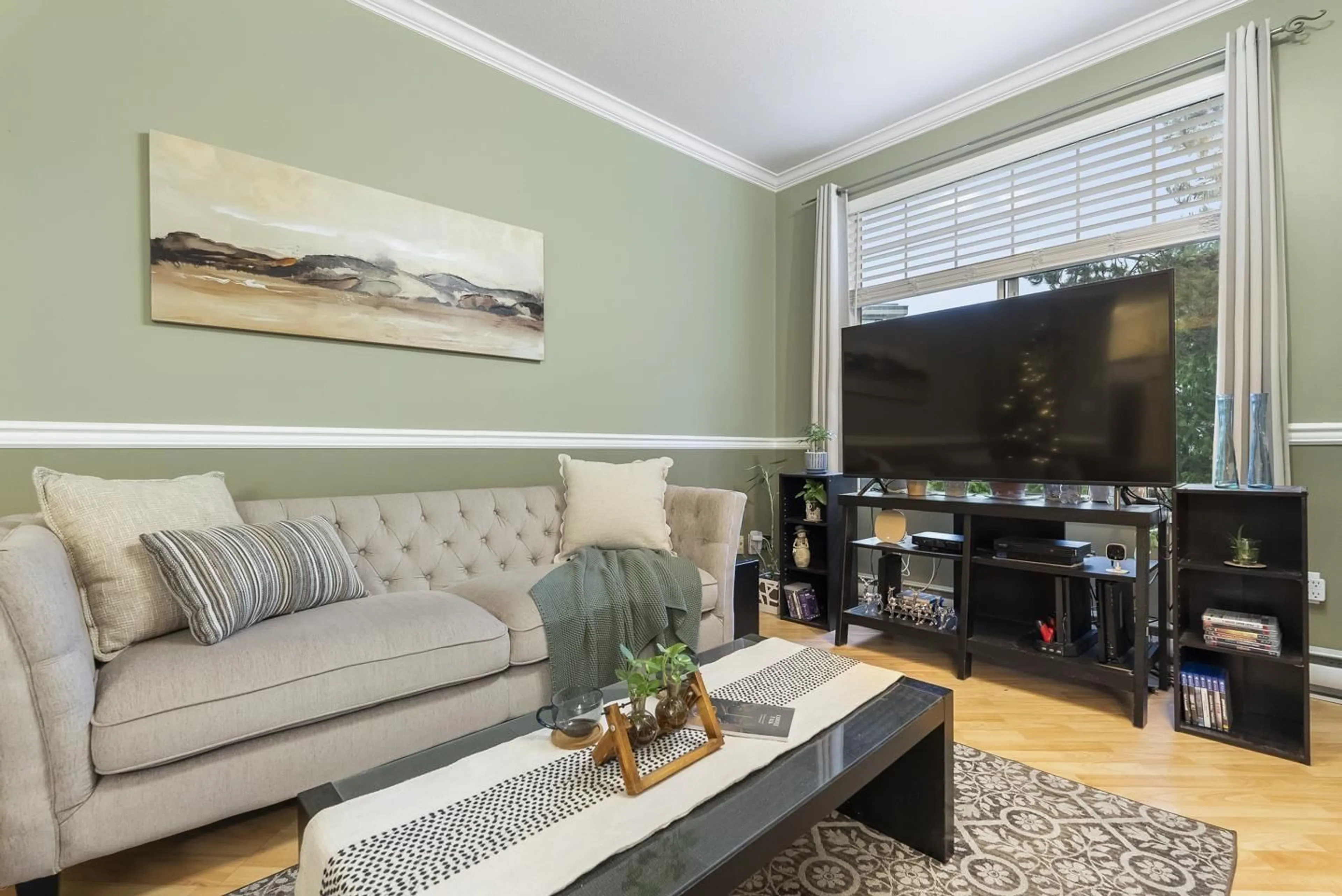 Living room with furniture, wood/laminate floor for 311 - 5677 208 STREET, Langley British Columbia V3A8J5