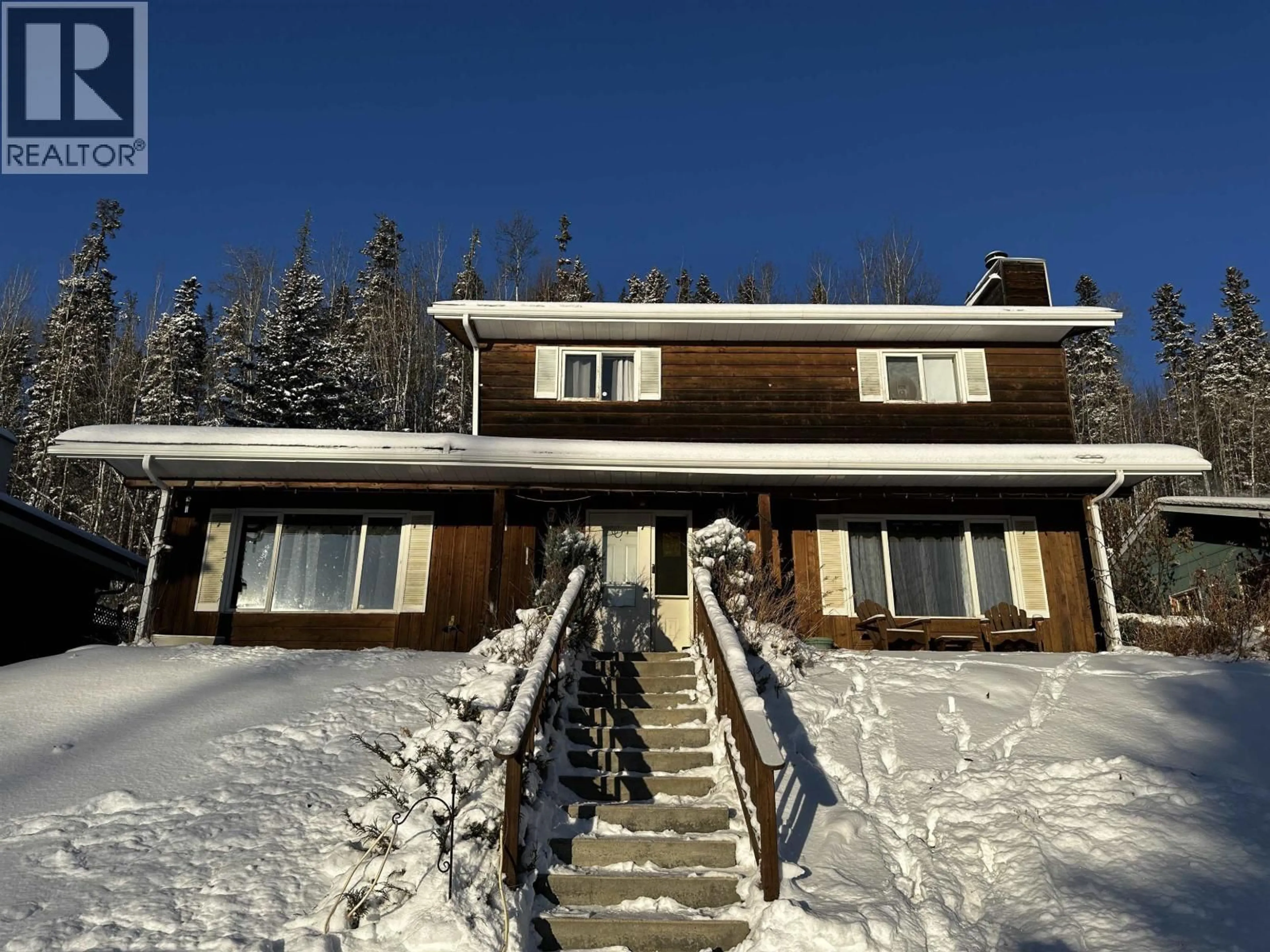 A pic from outside/outdoor area/front of a property/back of a property/a pic from drone, unknown for 5735 GAIRDNER CRESCENT, Fort Nelson British Columbia V0C1R0