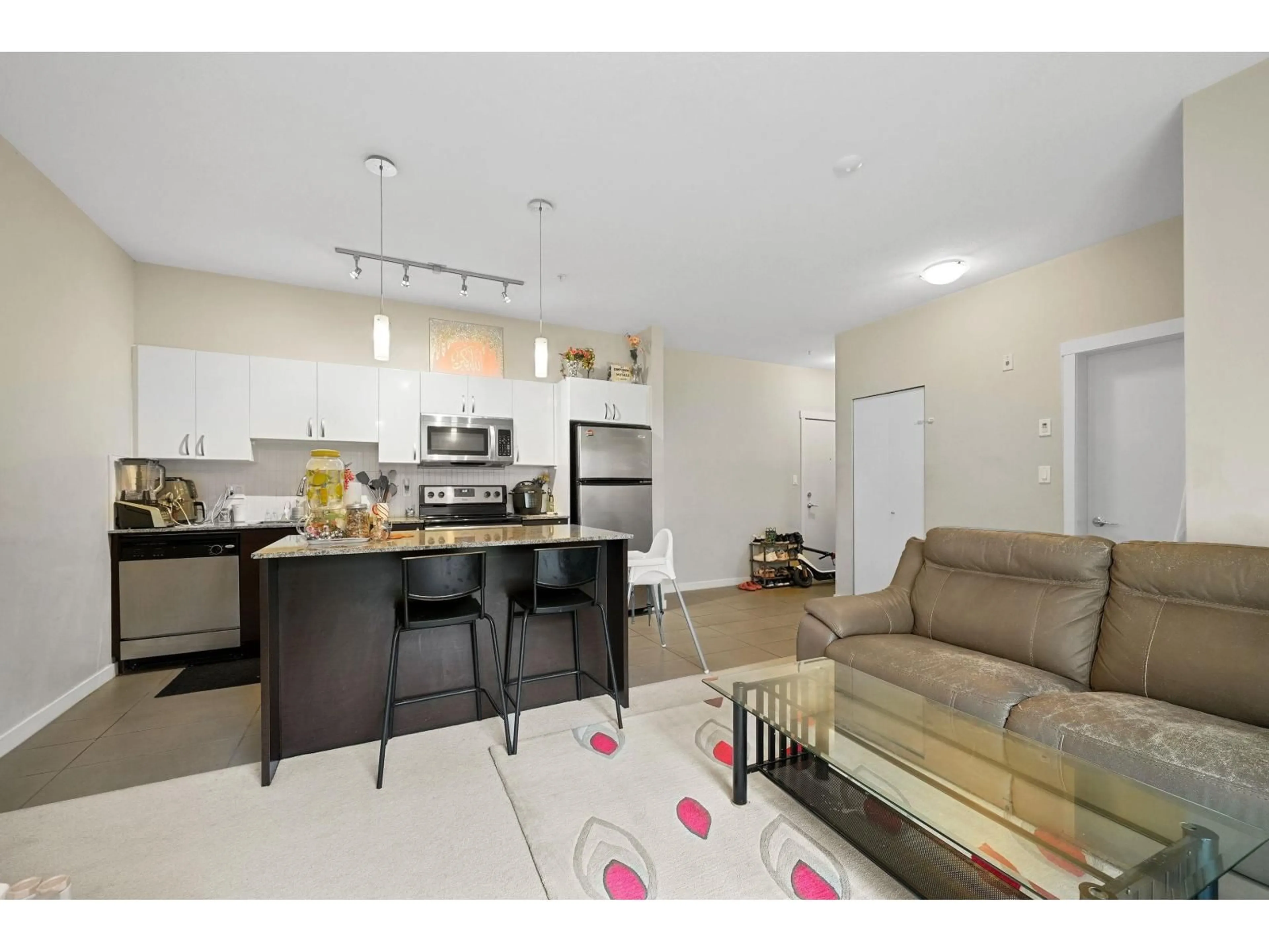 Open concept kitchen, unknown for 210 - 13728 108 AVENUE, Surrey British Columbia V3T0G2