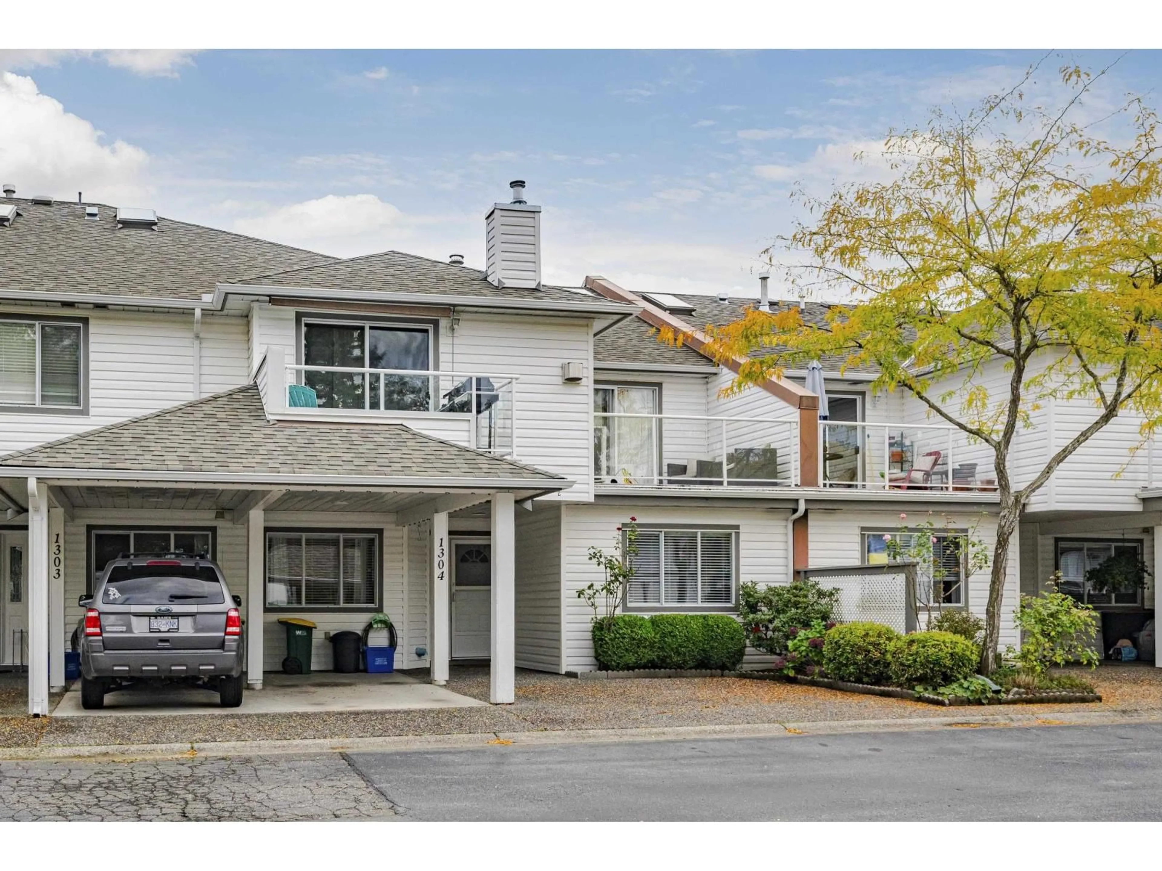 Home with vinyl exterior material, street for 1304 - 21937 48 AVENUE, Langley British Columbia V3A8C3