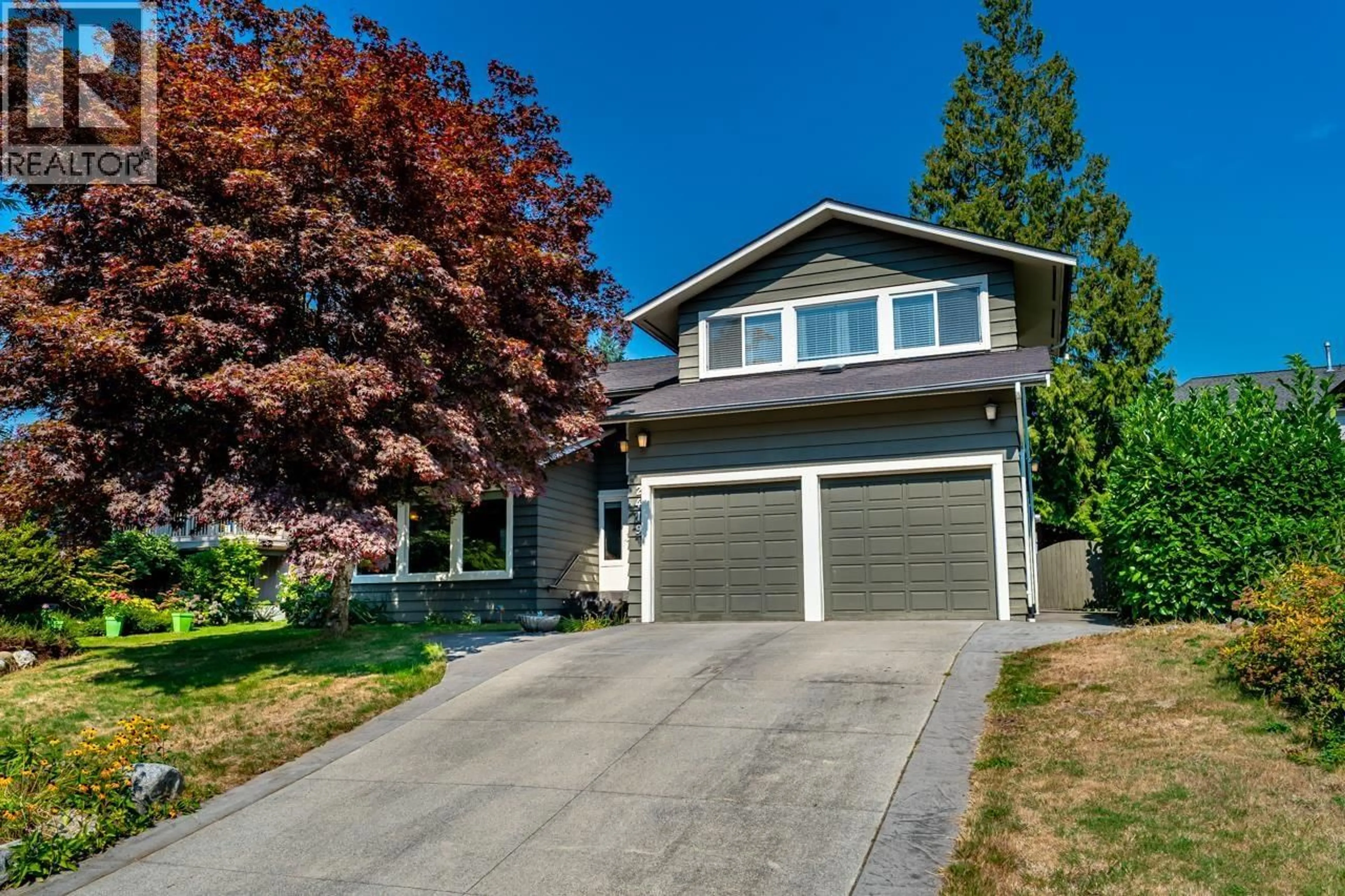 Home with vinyl exterior material, street for 2419 ORANDA AVENUE, Coquitlam British Columbia V3K3A5