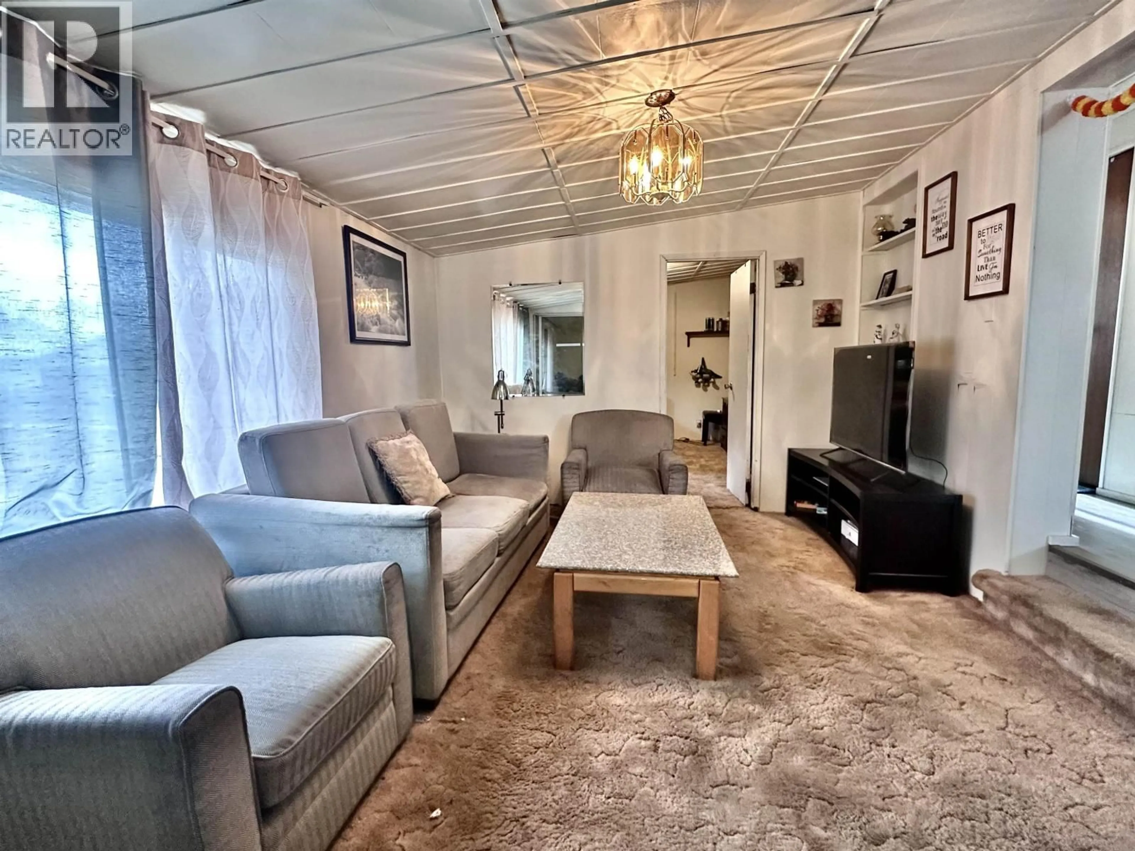 Living room with furniture, unknown for 1085 3RD AVENUE, Valemount British Columbia V0E2Z0