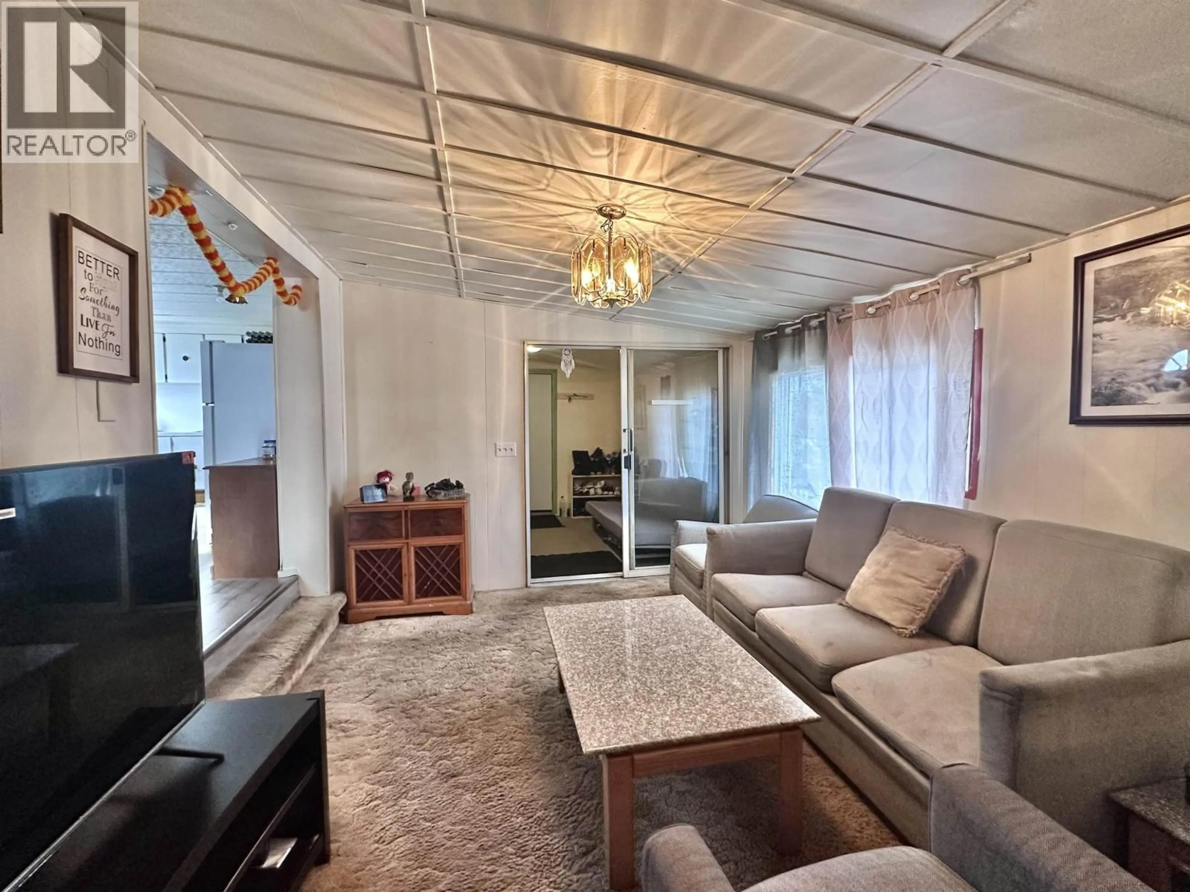 Living room with furniture, unknown for 1085 3RD AVENUE, Valemount British Columbia V0E2Z0