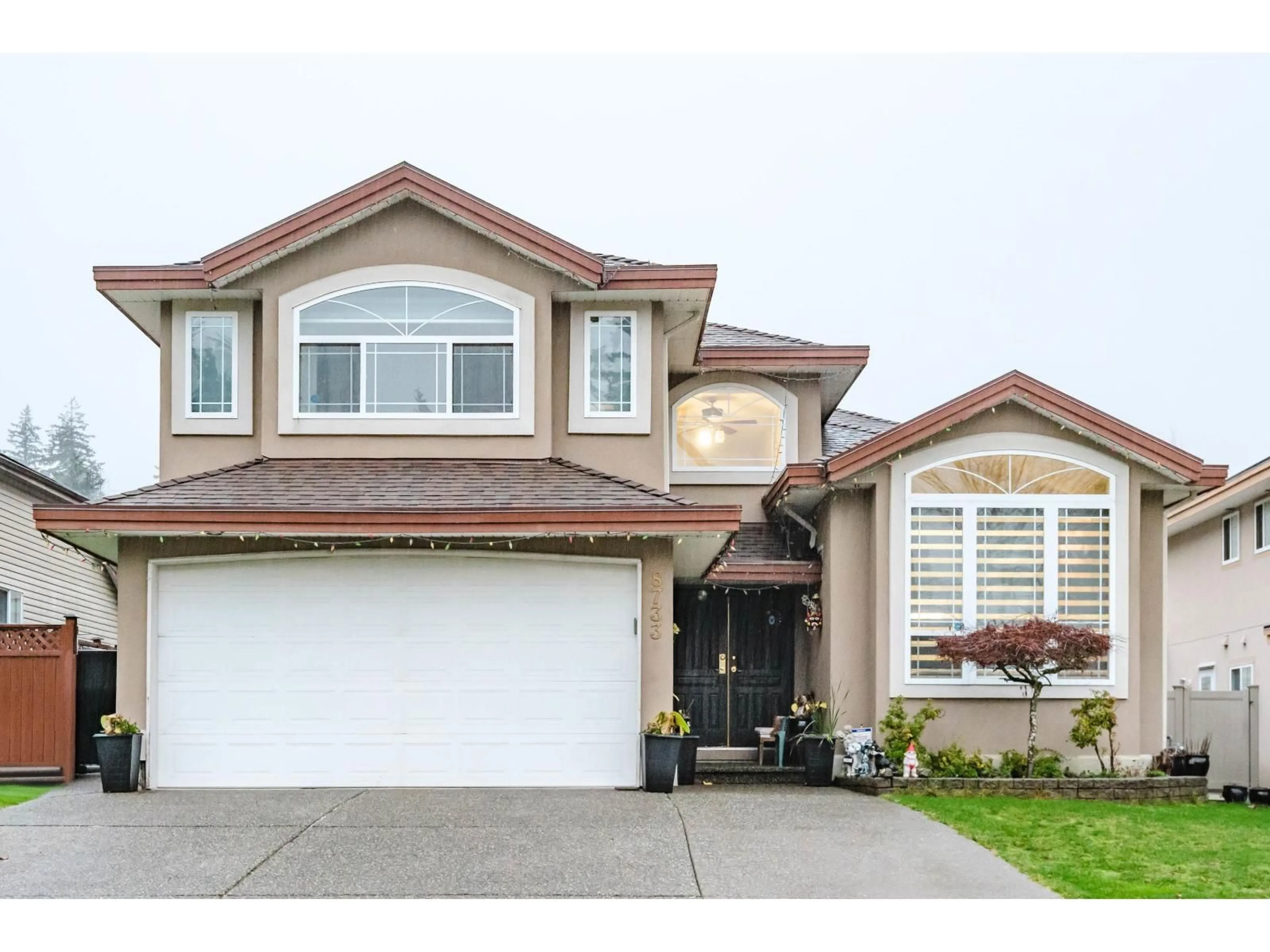 Home with vinyl exterior material, street for 8733 162A STREET, Surrey British Columbia V4N1B7