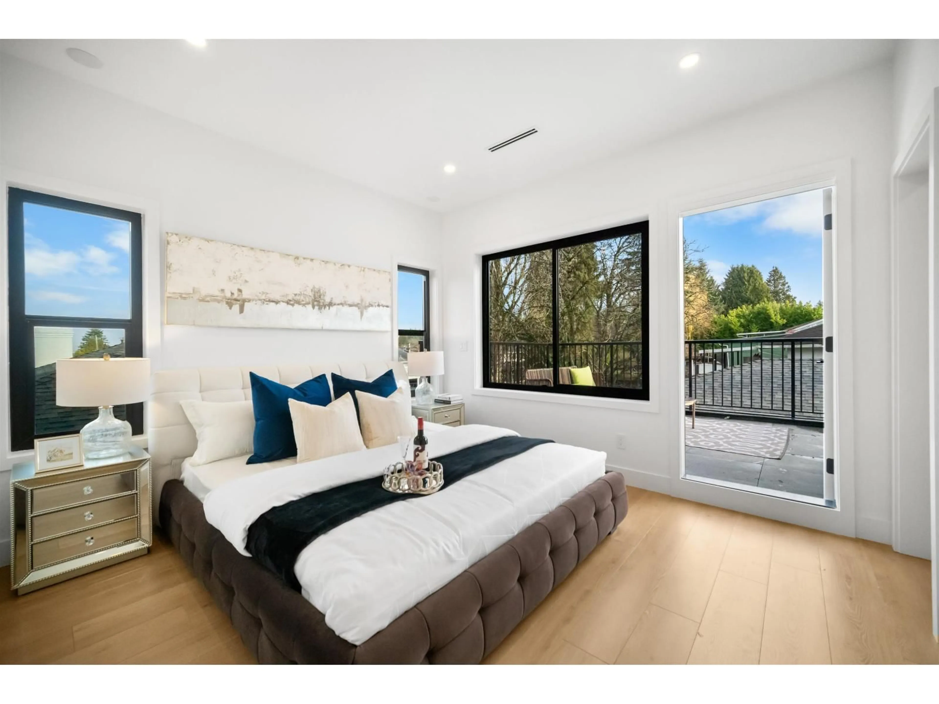 Bedroom with bed, wood/laminate floor for 9216 114 STREET, Delta British Columbia V4C3K8