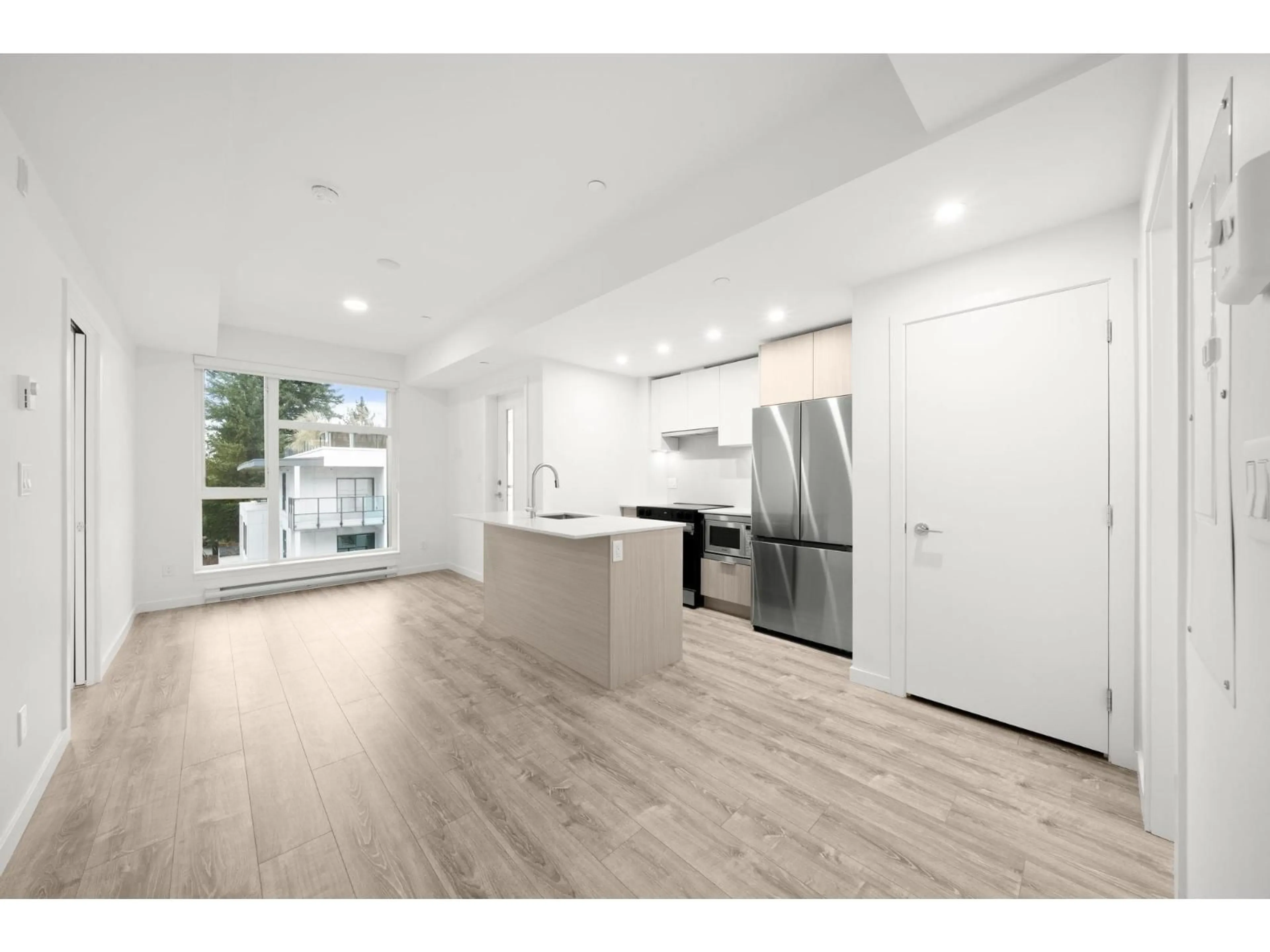 Open concept kitchen, unknown for 420 - 10828 139A STREET, Surrey British Columbia V3R0H3