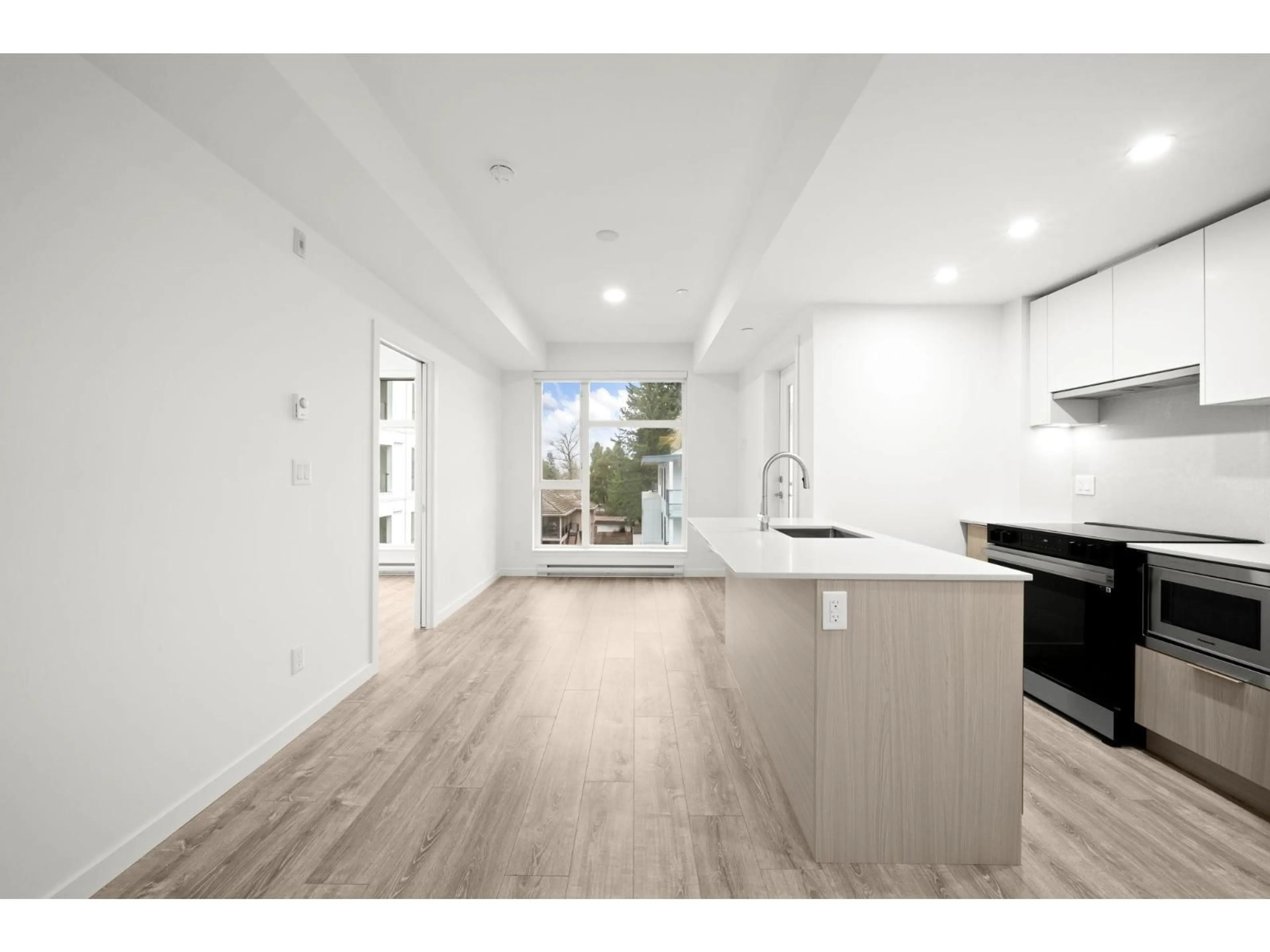 Open concept kitchen, unknown for 420 - 10828 139A STREET, Surrey British Columbia V3R0H3