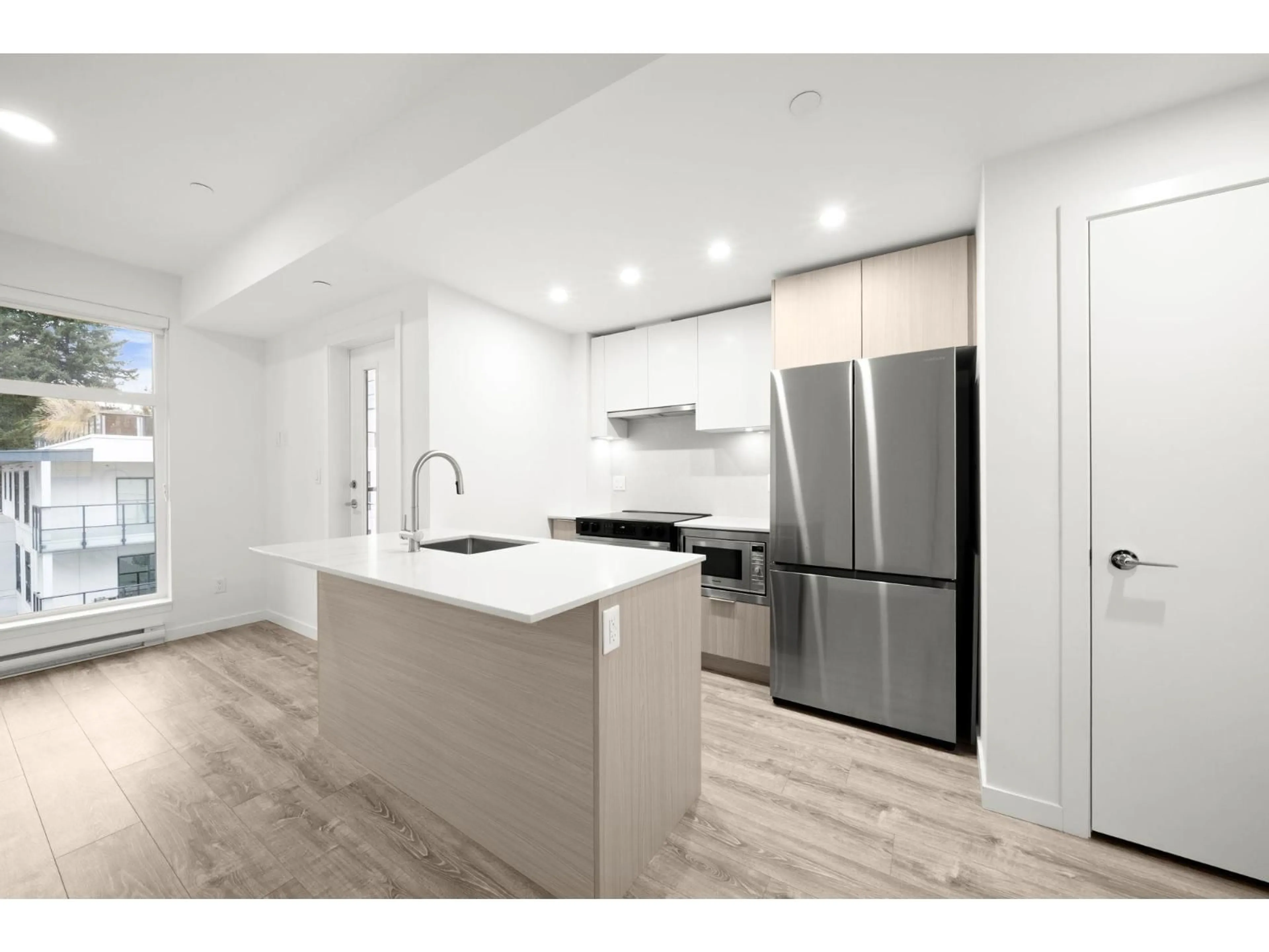 Open concept kitchen, unknown for 420 - 10828 139A STREET, Surrey British Columbia V3R0H3