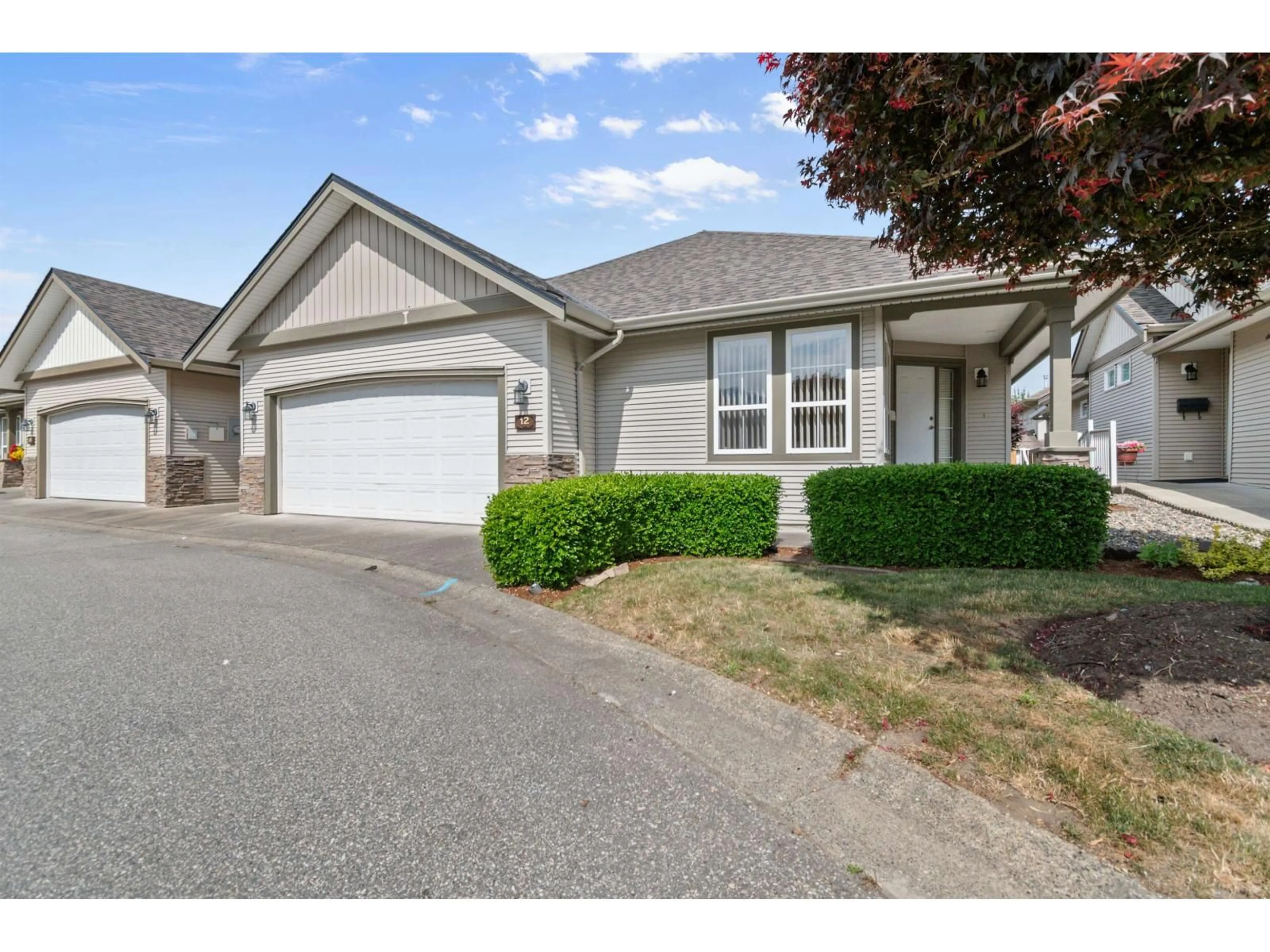 Home with vinyl exterior material, street for 12 - 45819 STEVENSON ROAD, Chilliwack British Columbia V2R5T4