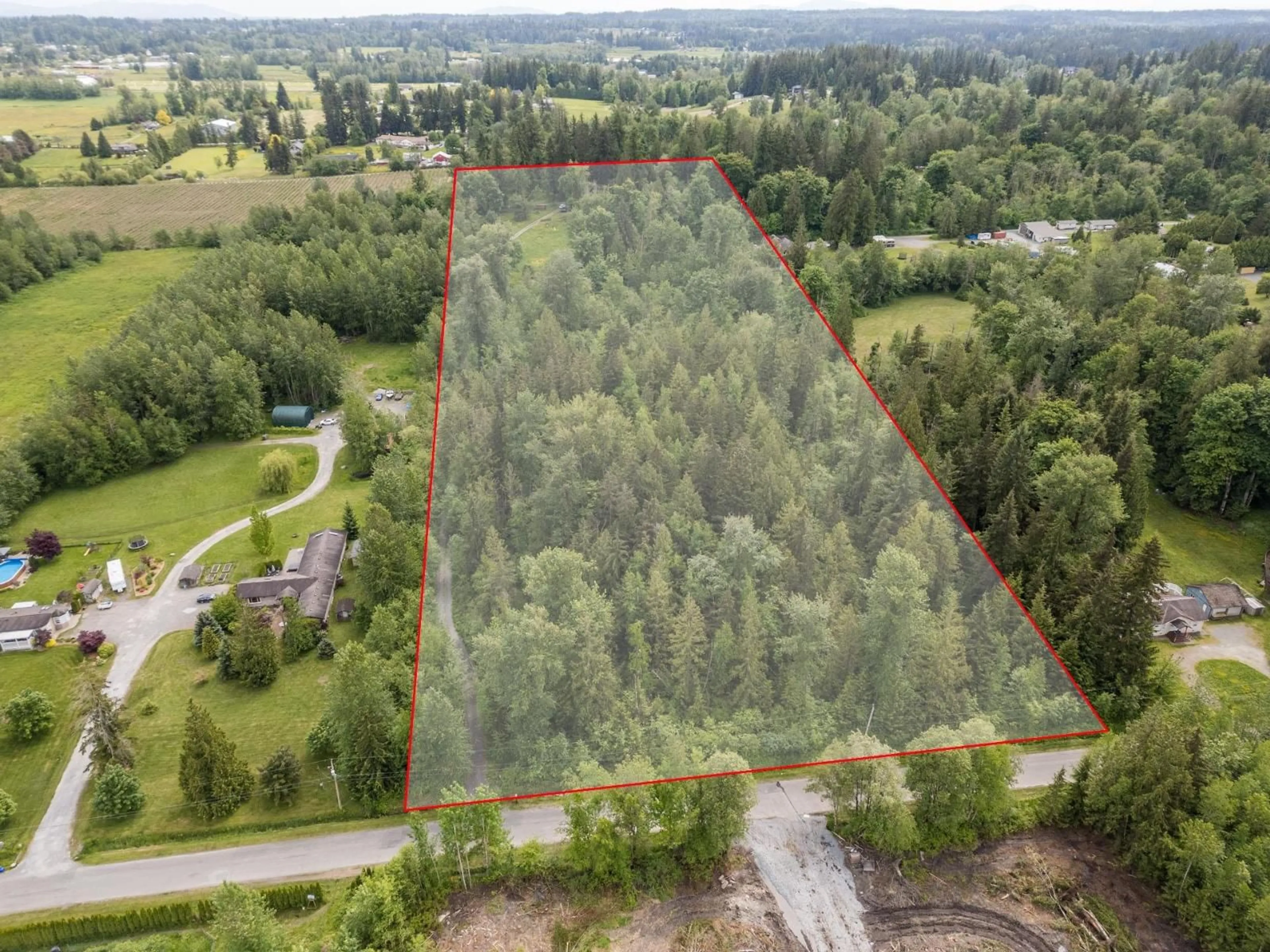 A pic from outside/outdoor area/front of a property/back of a property/a pic from drone, forest/trees view for 3390 210 STREET, Langley British Columbia V2Z2E5