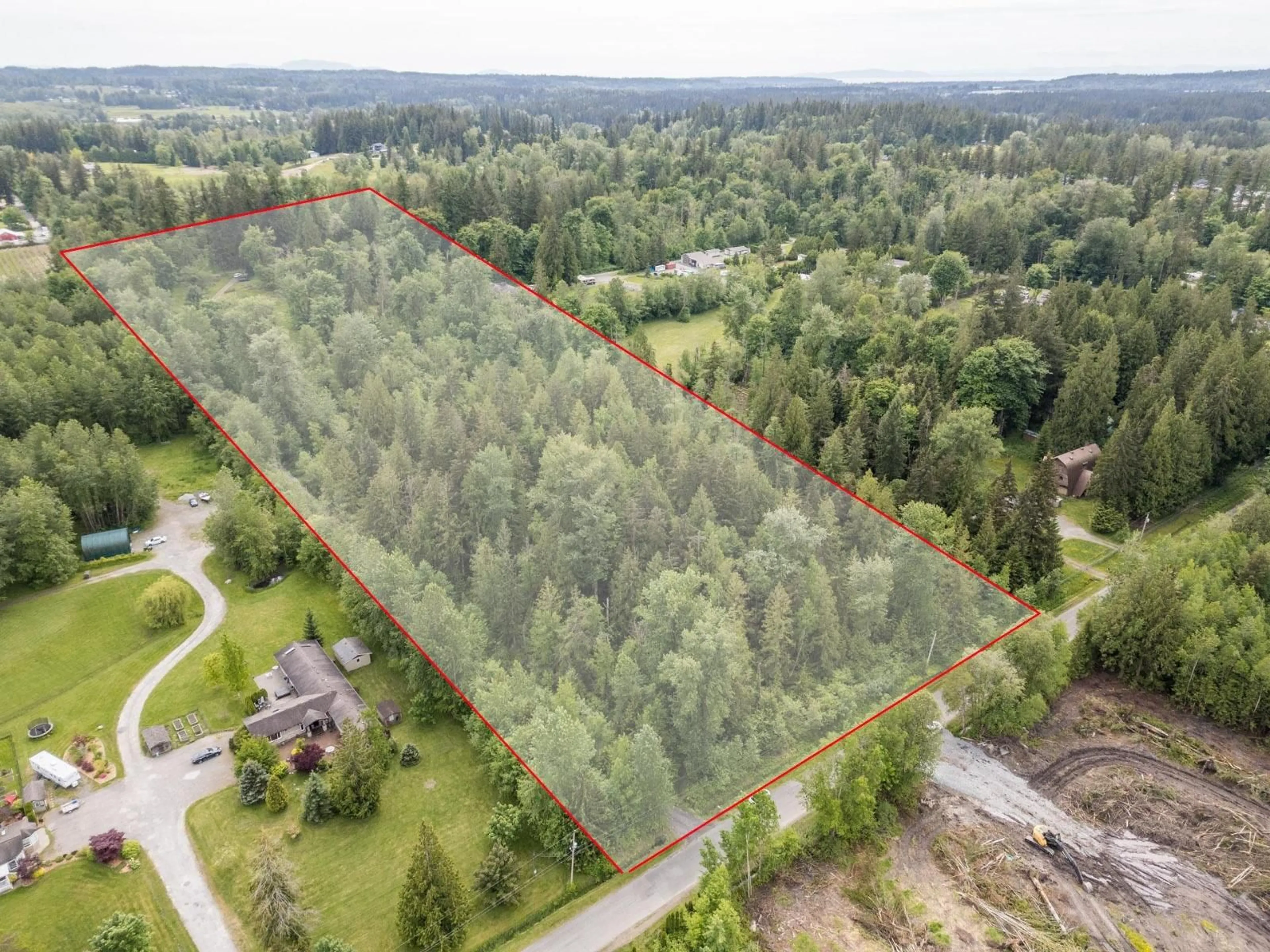 A pic from outside/outdoor area/front of a property/back of a property/a pic from drone, forest/trees view for 3390 210 STREET, Langley British Columbia V2Z2E5