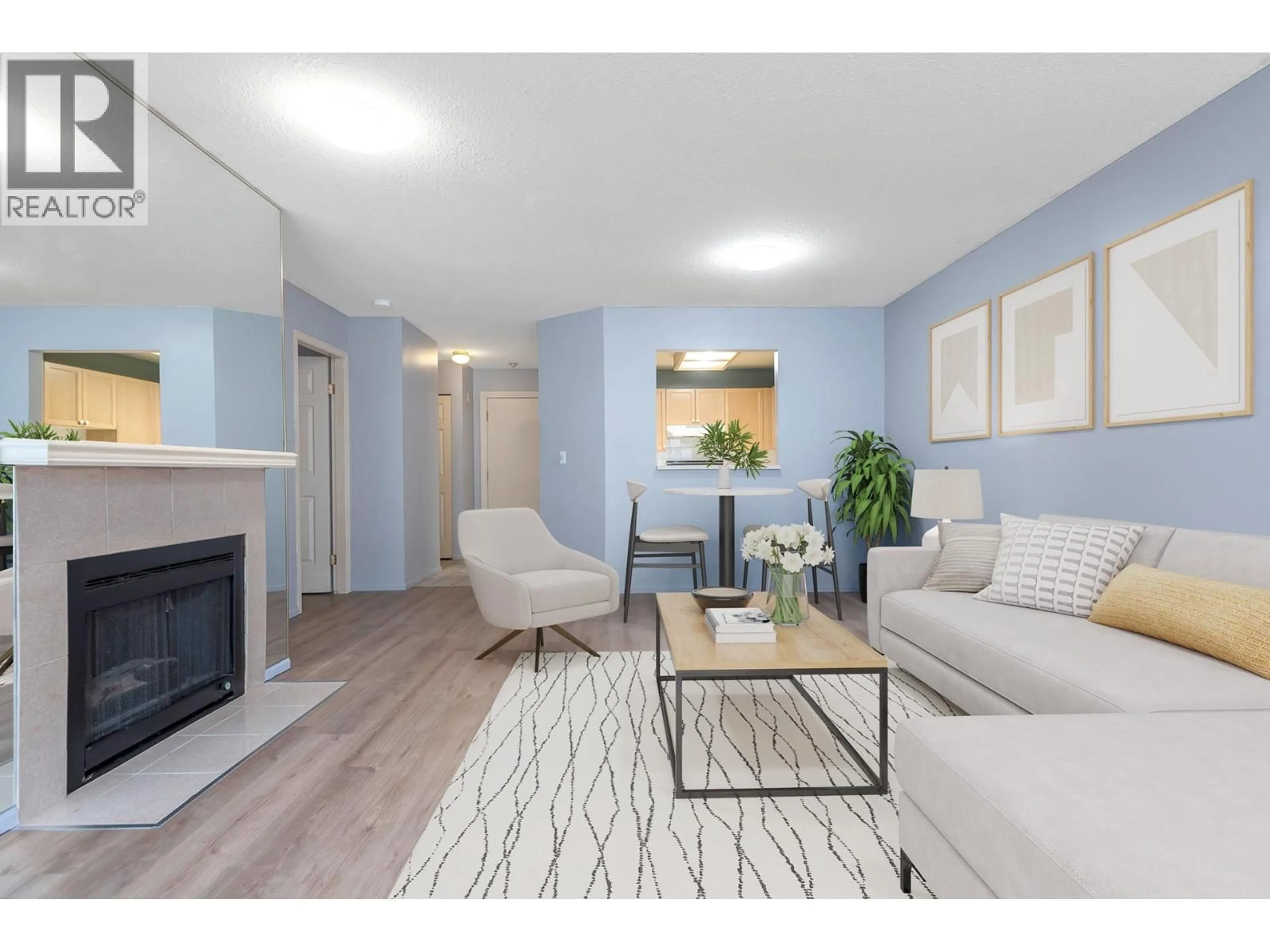 Living room with furniture, wood/laminate floor for 109 - 8751 GENERAL CURRIE ROAD, Richmond British Columbia V6Y3T7