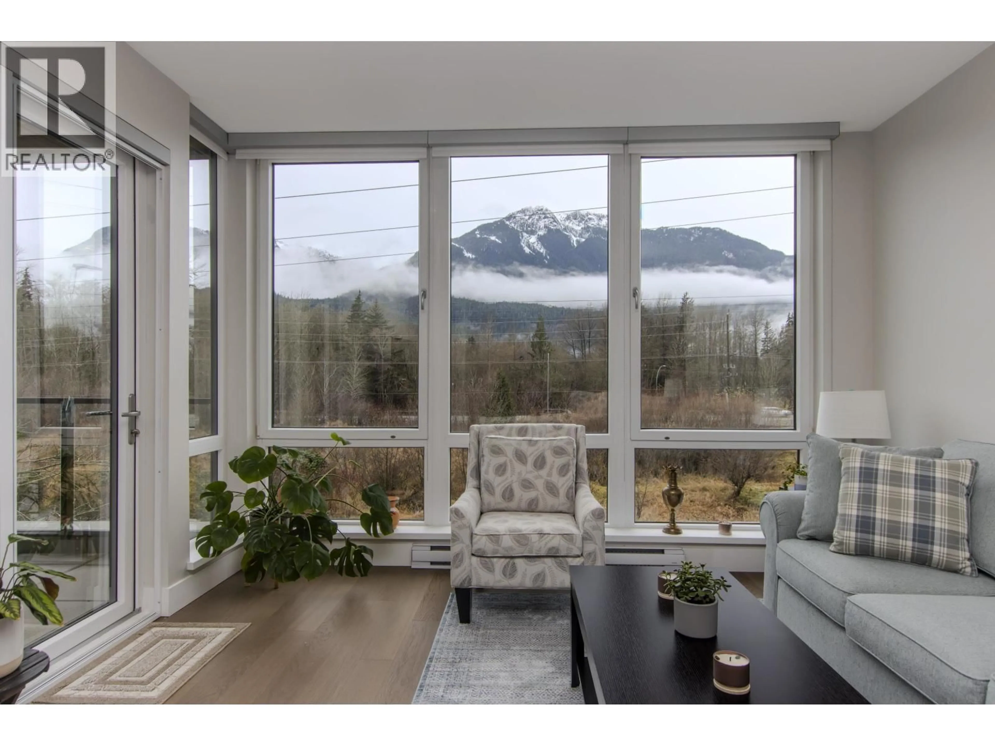 Living room with furniture, unknown for 202 - 1870 DOWAD DRIVE, Squamish British Columbia V8B1C4