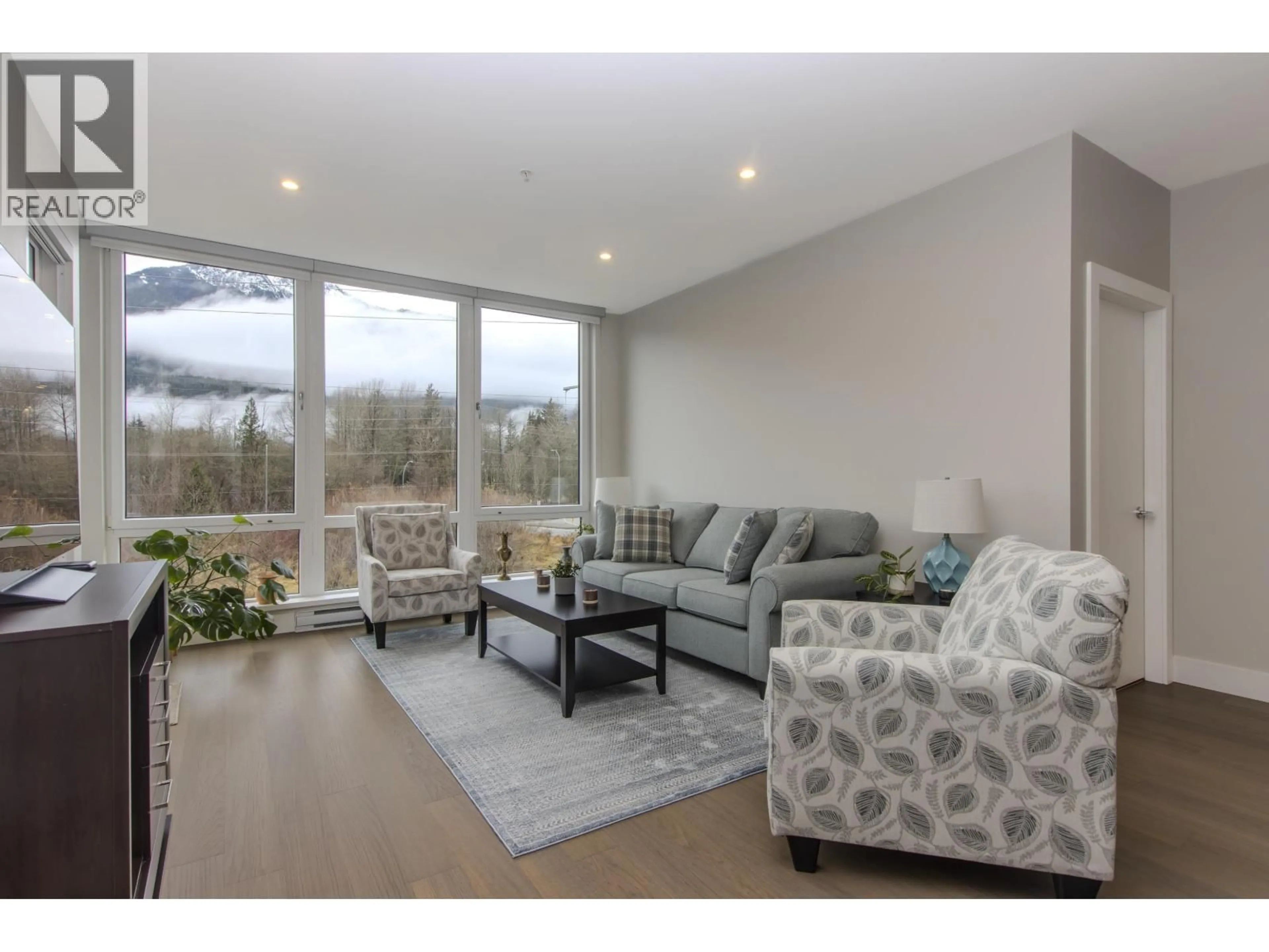 Living room with furniture, unknown for 202 - 1870 DOWAD DRIVE, Squamish British Columbia V8B1C4