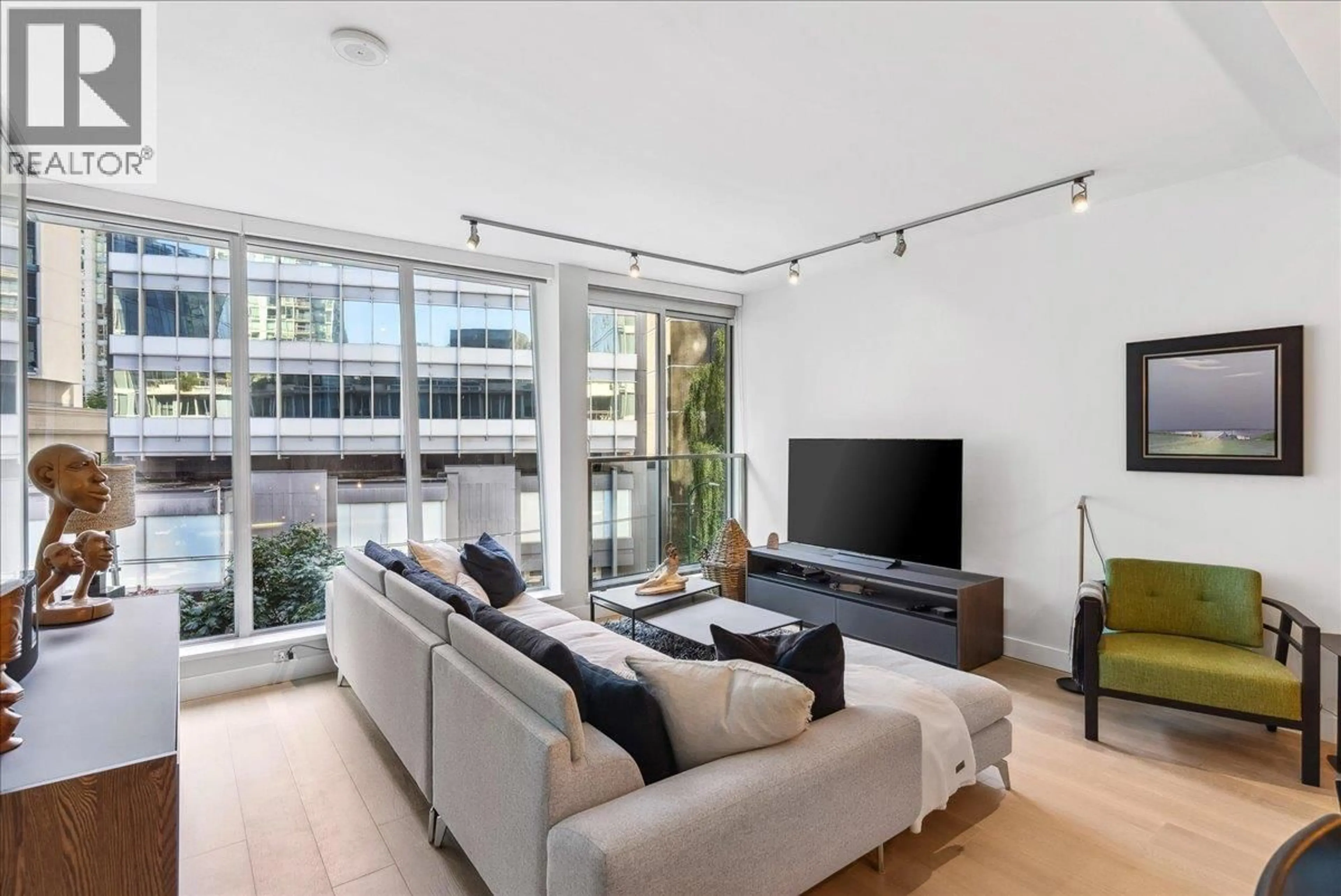 Living room with furniture, unknown for 402 - 1477 PENDER STREET, Vancouver British Columbia V6G2S3